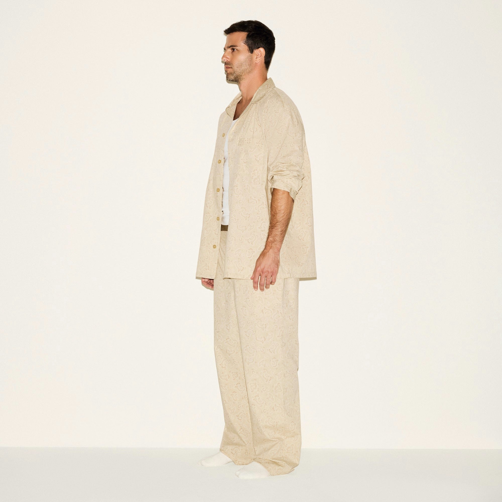 COTTON POPLIN MENS LONG SLEEP SET | TAN PAISLEY PRINT ON A MODEL SIDE VIEW | FOCUS: 0.0, 1.0, 0.9