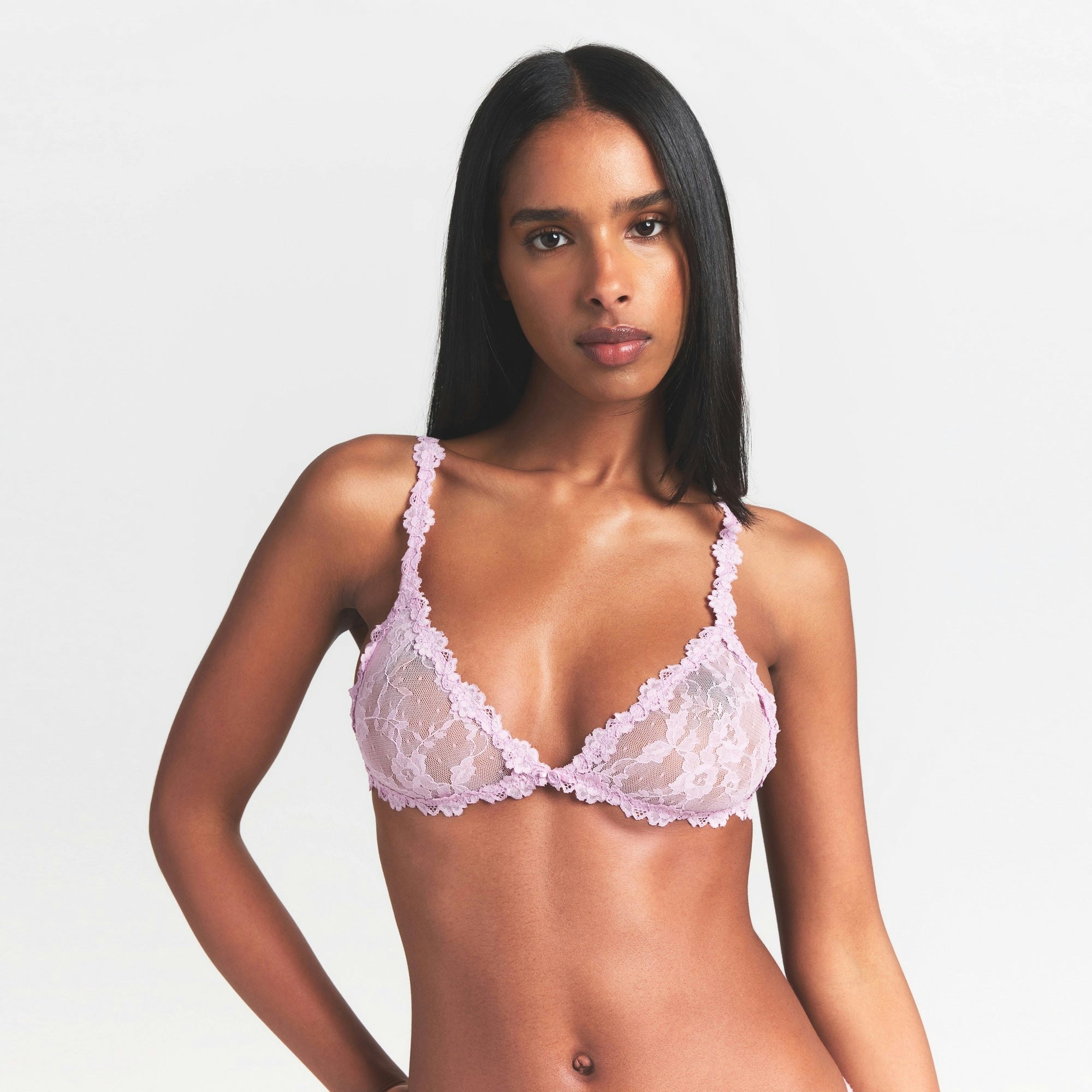 STRETCH LACE TRIANGLE BRALETTE | BABY PINK ON A MODEL SIDE VIEW @ | FOCUS: 0.0, 1.0, 0.9