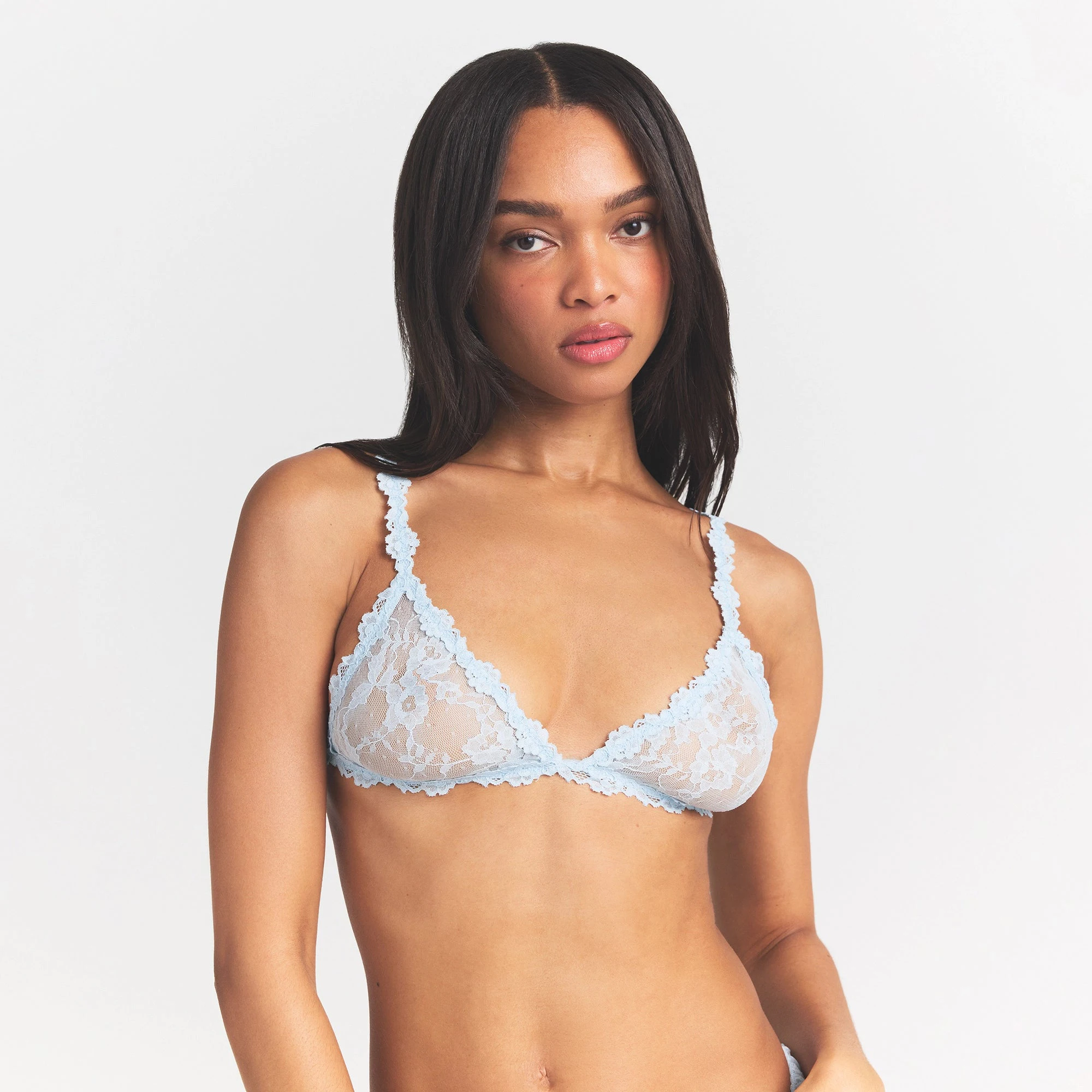 STRETCH LACE TRIANGLE BRALETTE | POWDER BLUE ON A MODEL FRONT VIEW @ | FOCUS: 0.0, 1.0, 0.9