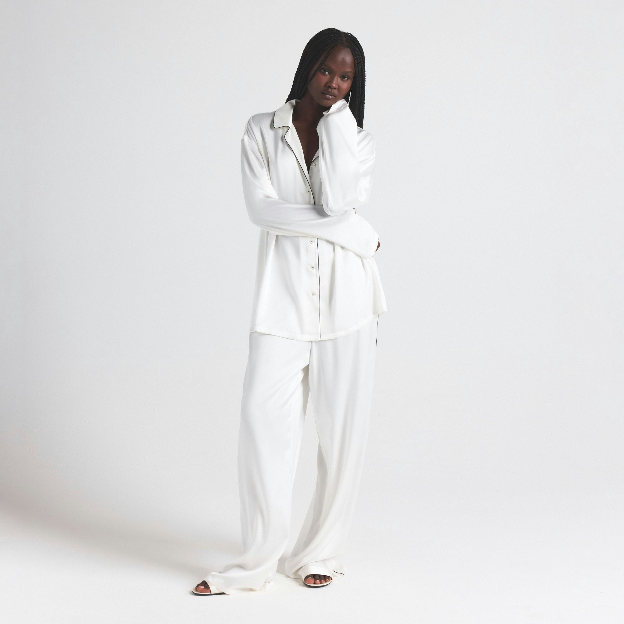 SILK LONG SLEEP SET | IVORY ON A MODEL FRONT ON A MODEL FRONT VIEW | FOCUS: 0.0, 1.0, 0.9