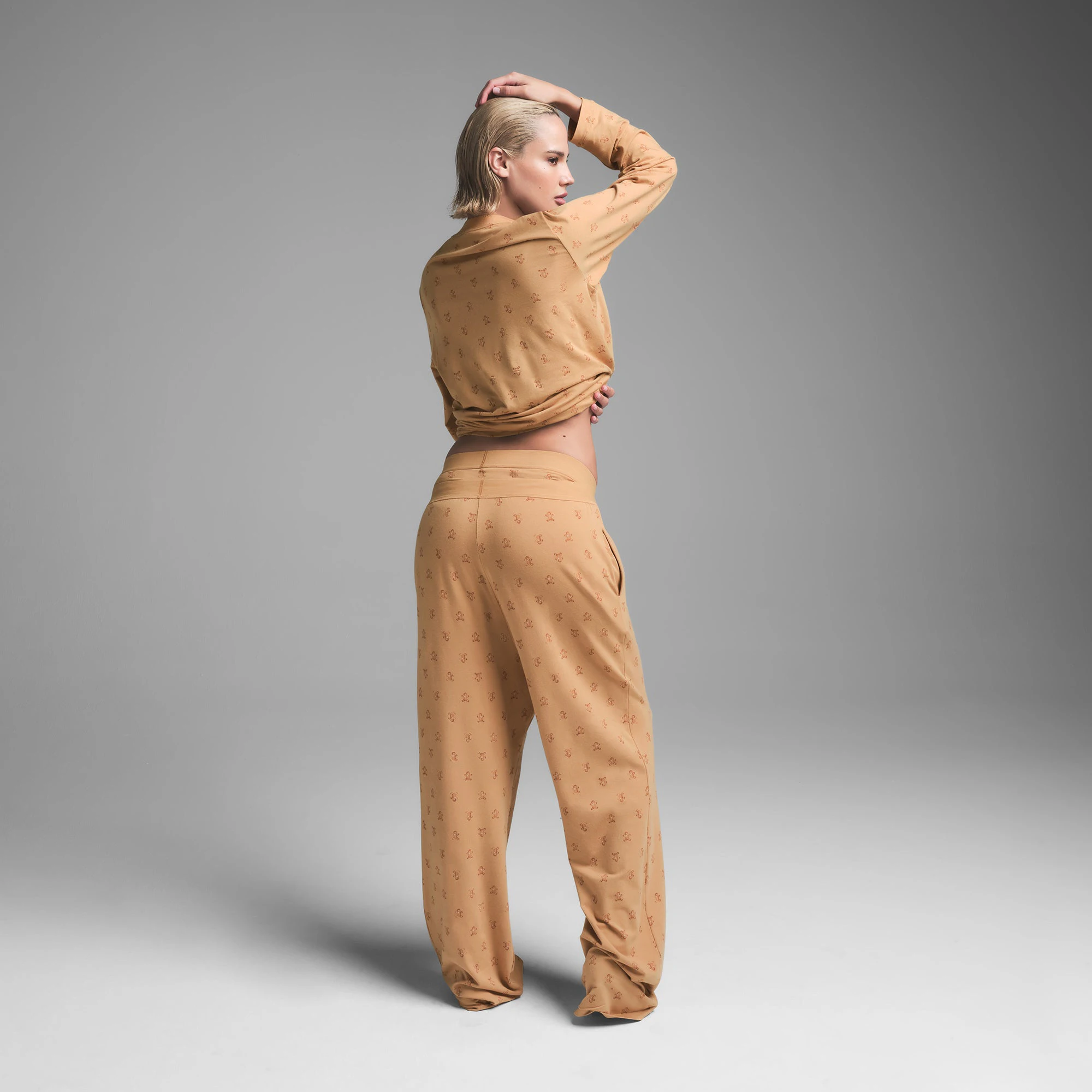 BOYFRIEND LONG SLEEVE T-SHIRT AND LOOSE PANT SET | CARAMEL GINGERBREAD PRINT ON A MODEL BACK VIEW