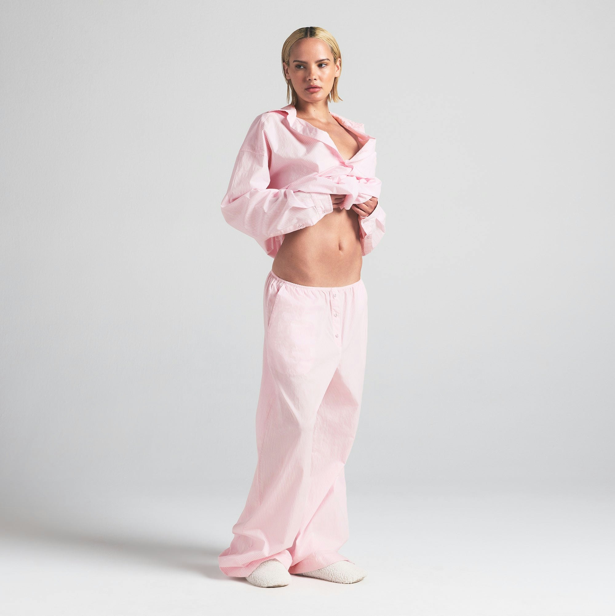 COTTON POPLIN OVERSIZED SLEEP SET | CHERRY BLOSSOM STRIPE ON A MODEL SIDE VIEW | FOCUS: 0.0, 1.0, 0.9