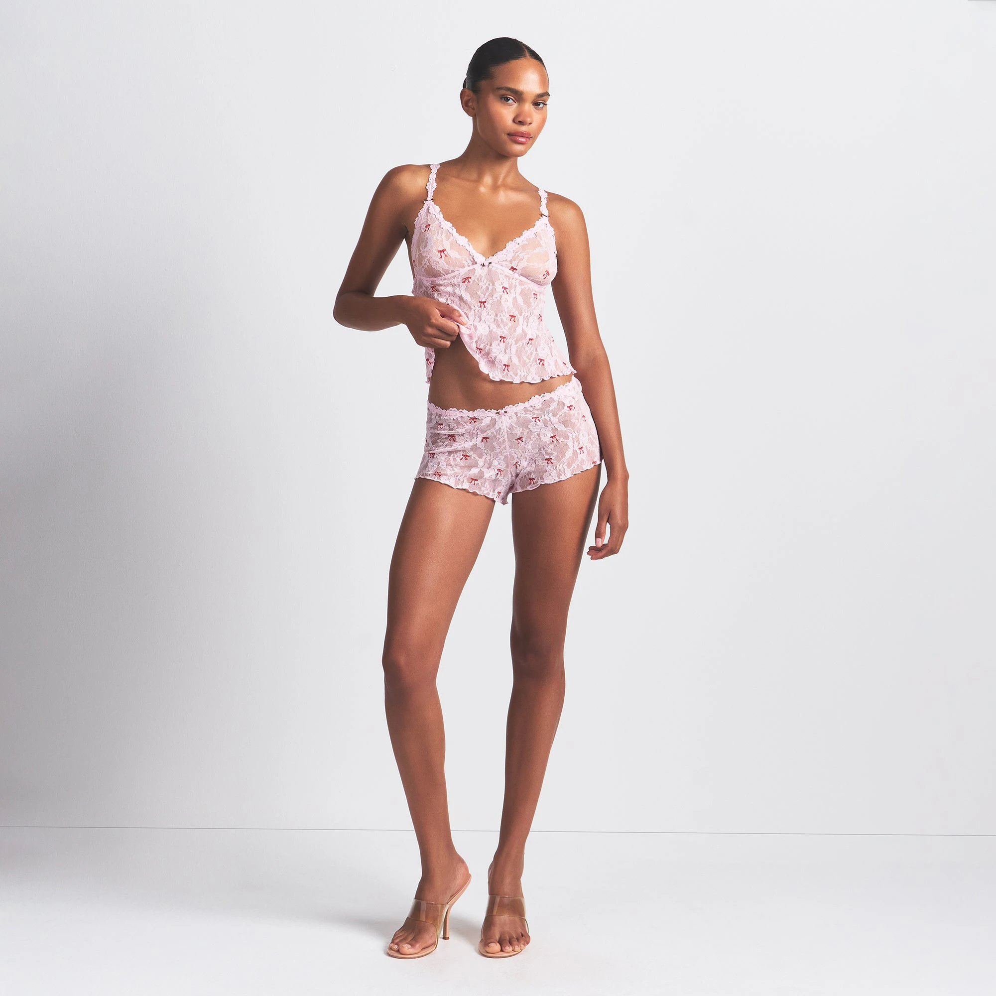 STRETCH LACE TRIANGLE CAMI AND SHORT SET | CHERRY BLOSSOM BOW PRINT ON A MODEL FRONT VIEW @ | FOCUS: 0.0, 1.0, 0.9