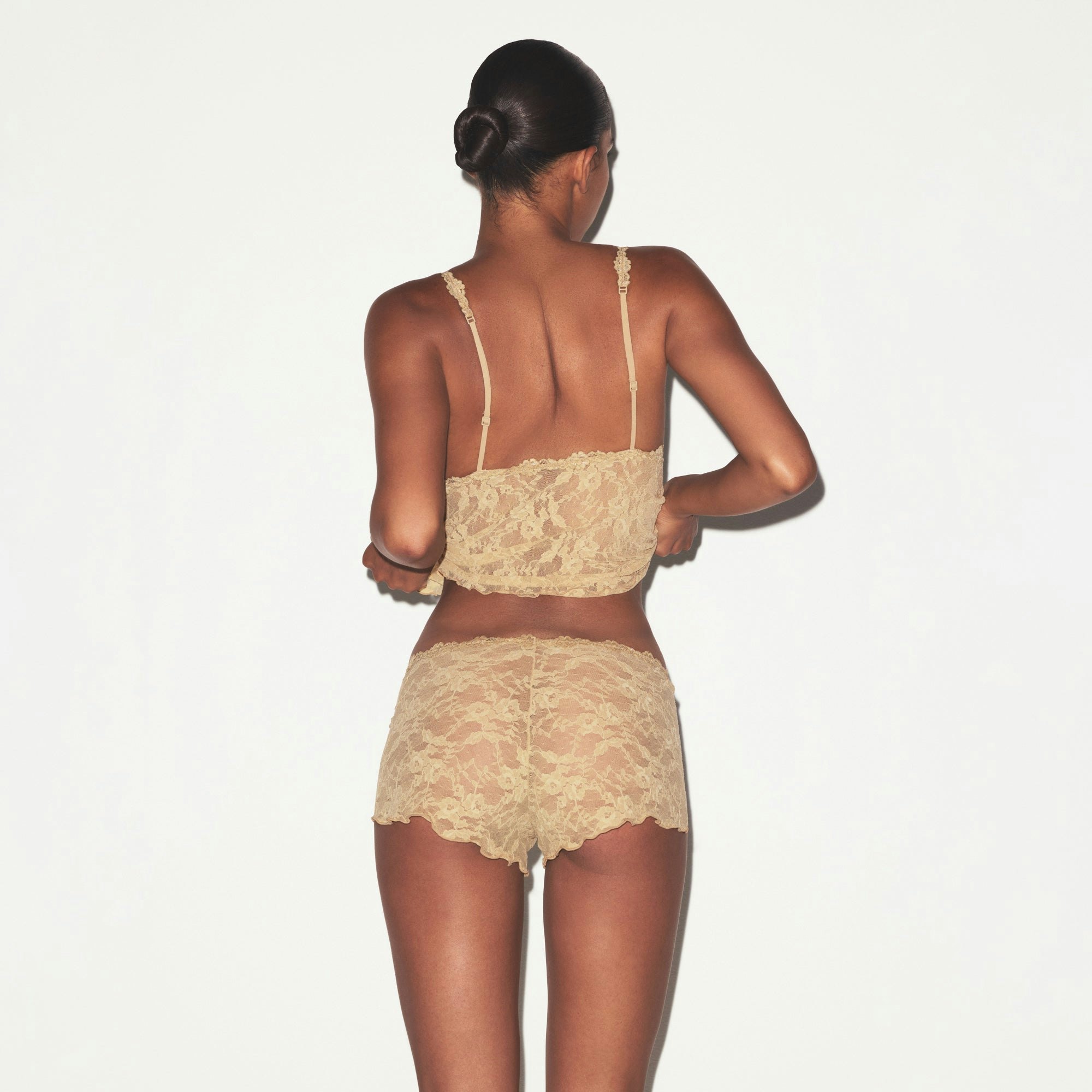STRETCH LACE TRIANGLE CAMI AND SHORT SET | DELTA ON A MODEL SIDE VIEW @ | FOCUS: 0.0, 1.0, 0.9