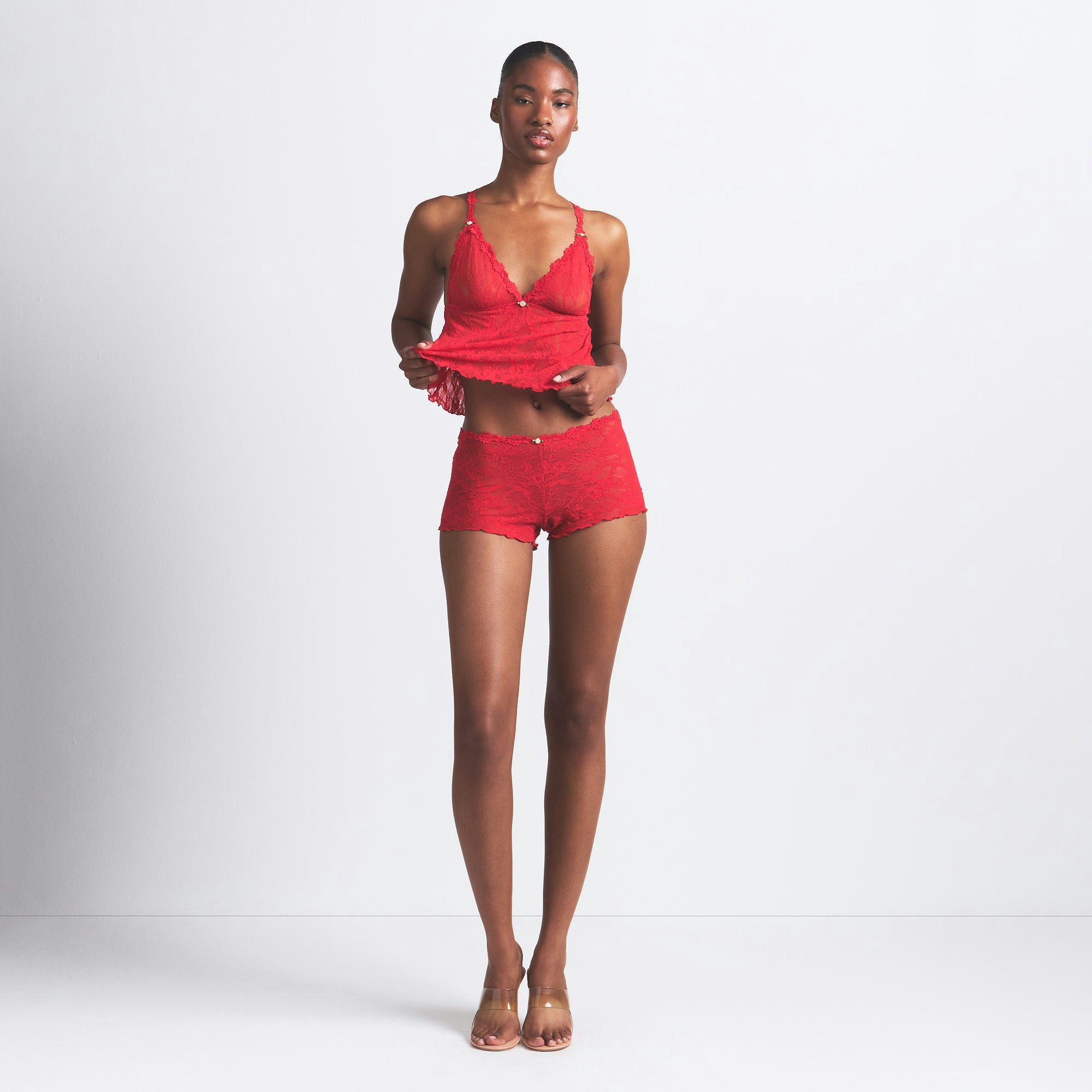 STRETCH LACE TRIANGLE CAMI AND SHORT SET | RED ON A MODEL FRONT VIEW @ | FOCUS: 0.0, 1.0, 0.9