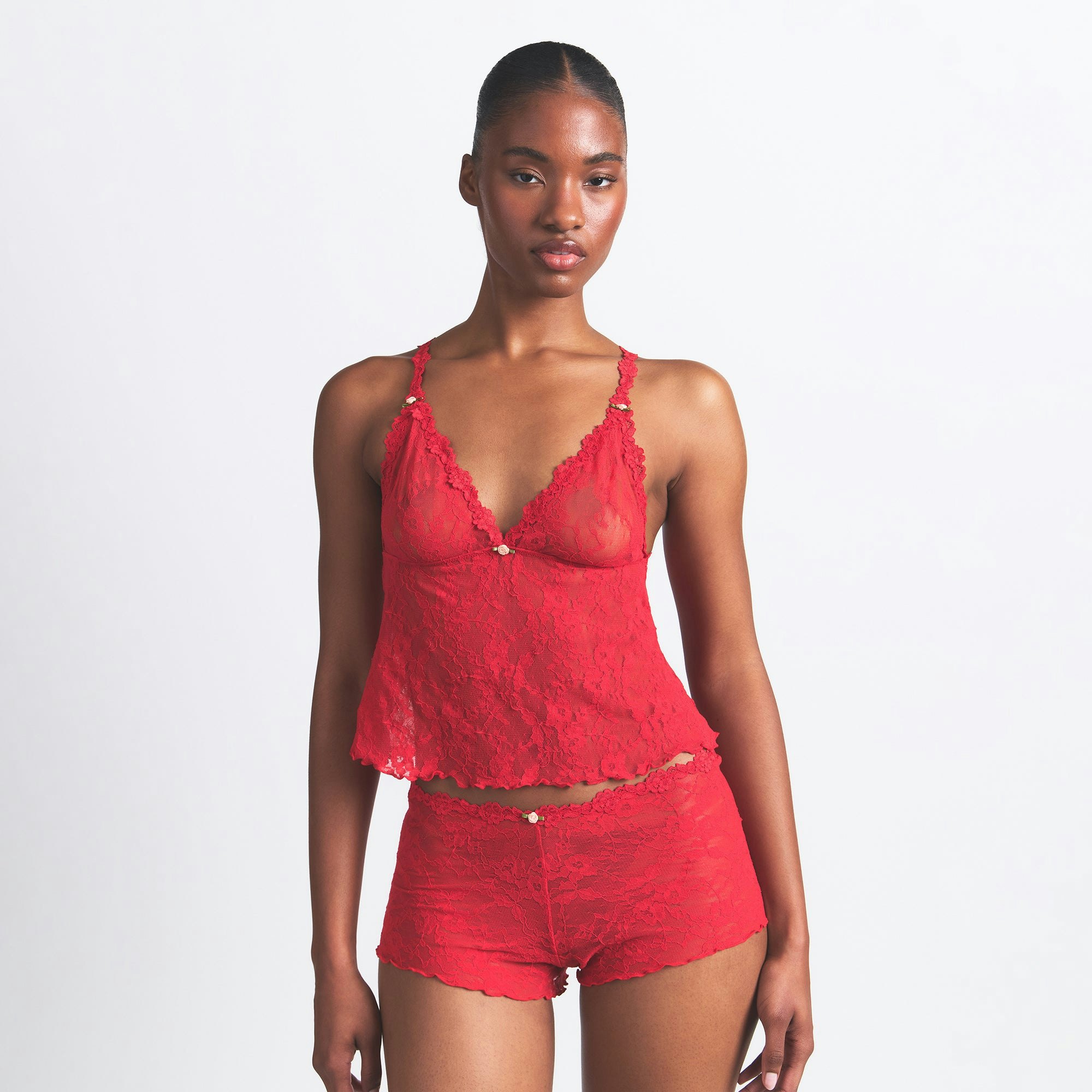 STRETCH LACE TRIANGLE CAMI AND SHORT SET | RED ON A MODEL FRONT VIEW @ | FOCUS: 0.0, 1.0, 0.9