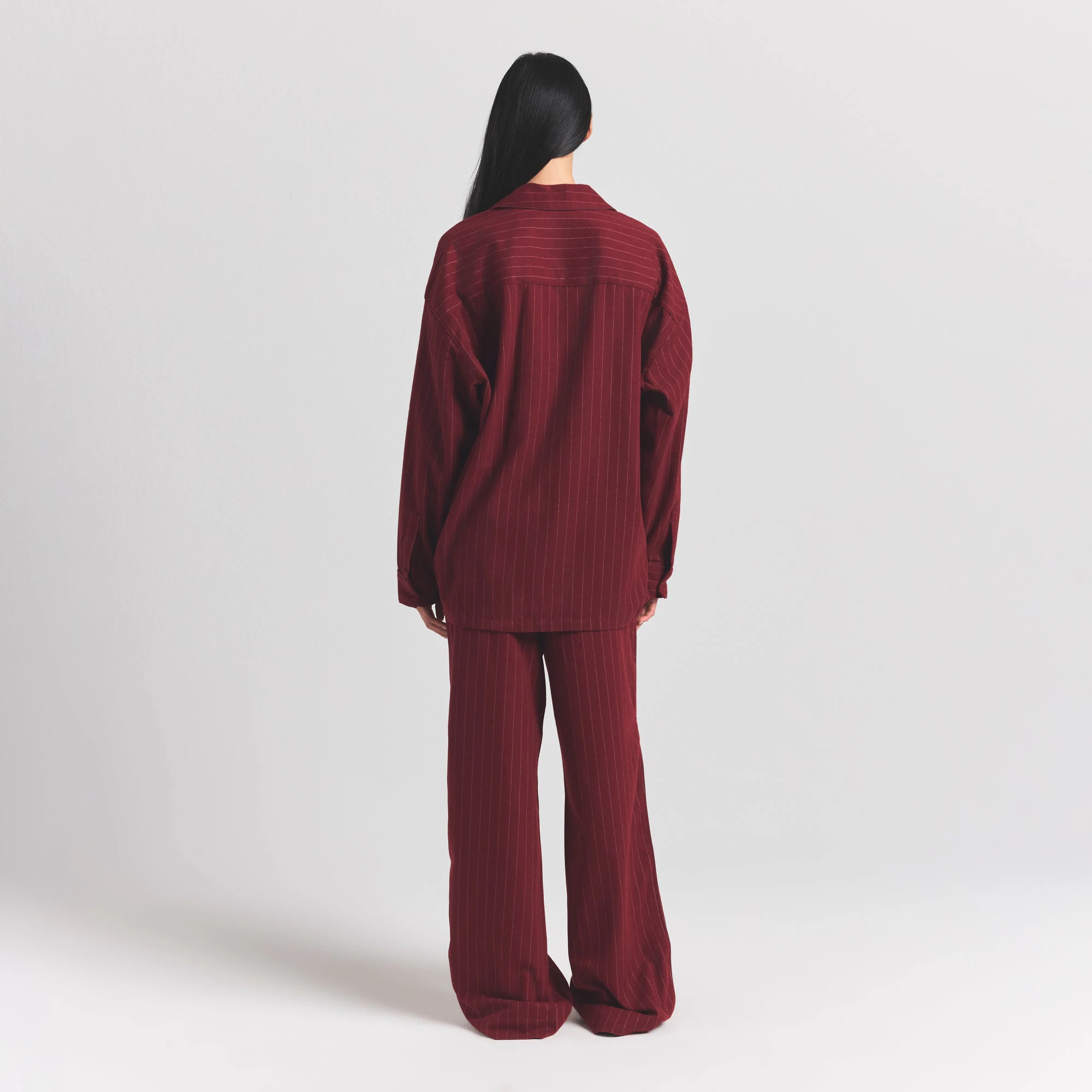 HEAVY FLANNEL SLEEP SET | MERLOT STRIPE ON A MODEL BACK VIEW ON A MODEL FRONT VIEW @ | FOCUS: 0.0, 1.0, 0.9