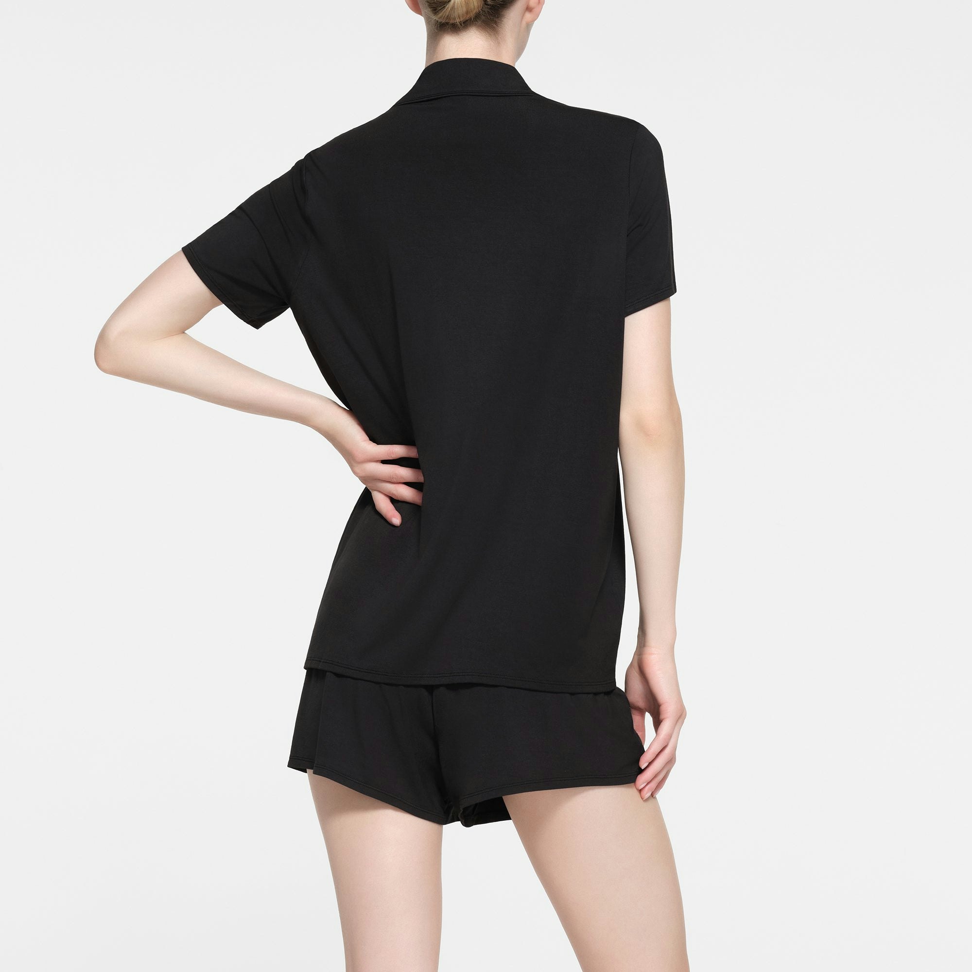 SKIMS SLEEP SHORT SLEEVE BUTTON UP SET | ONYX ON A MODEL BACK VIEW