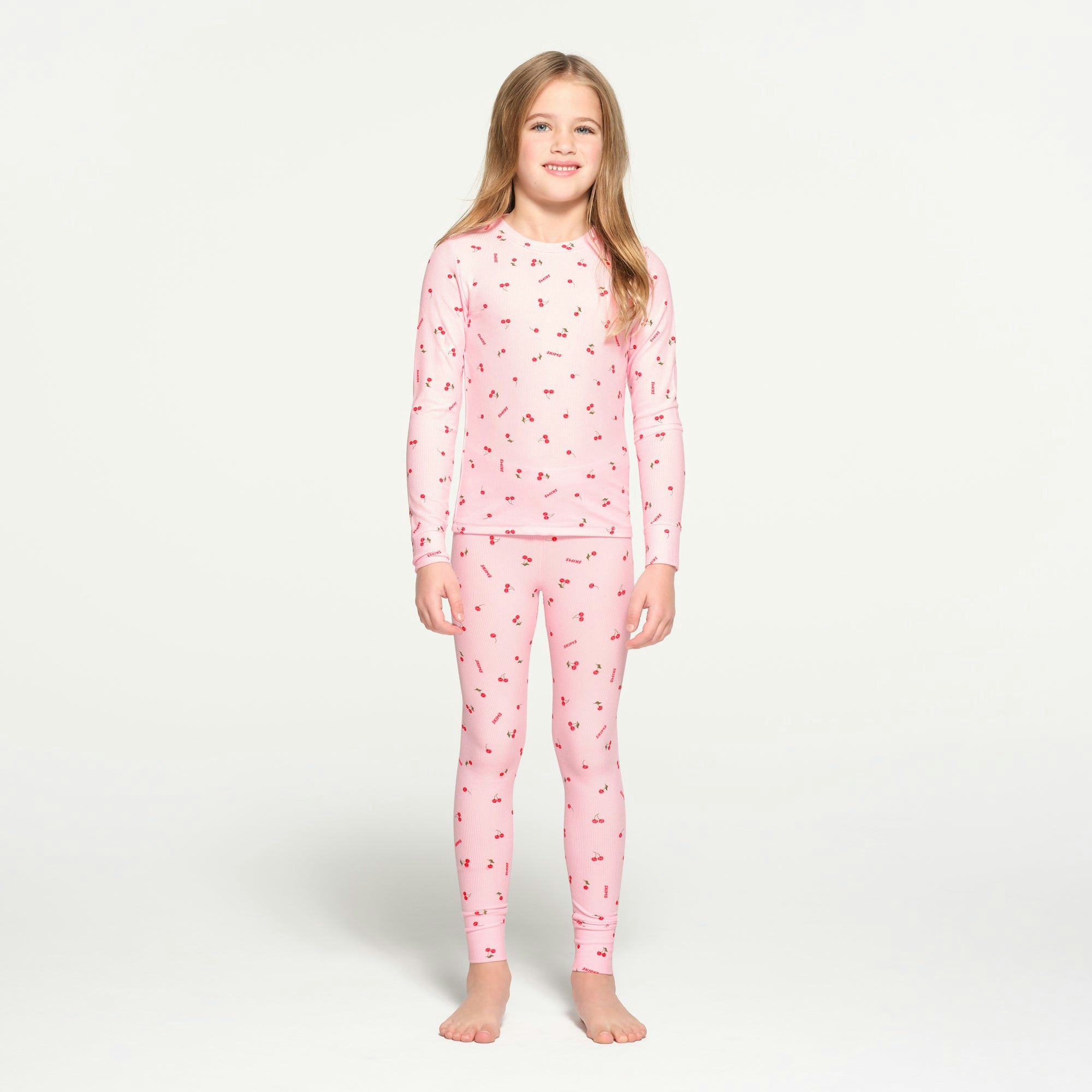 SOFT LOUNGE KIDS SLEEP SET | CHERRY BLOSSOM CHERRY PRINT ON A MODEL FRONT VIEW