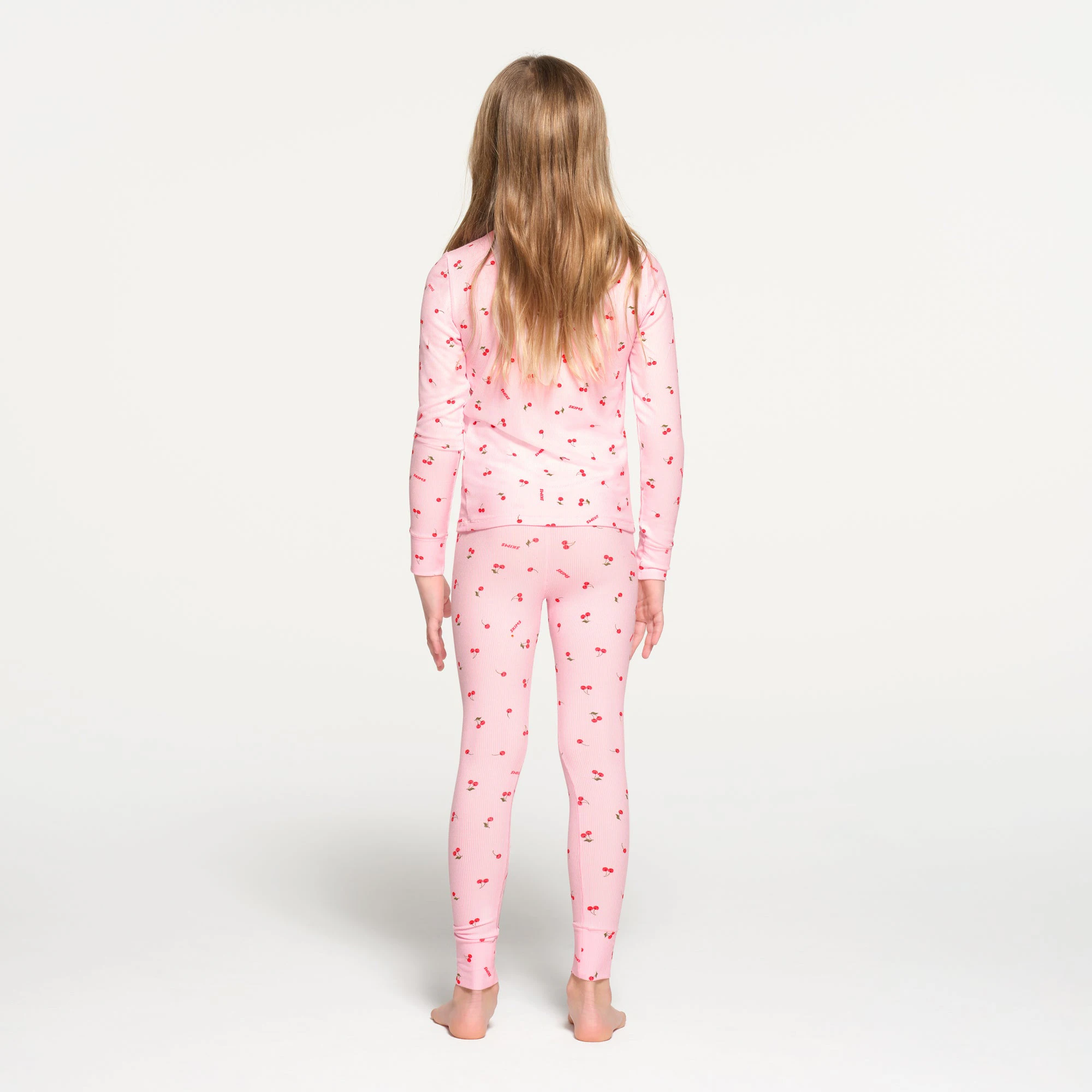 SOFT LOUNGE KIDS SLEEP SET | CHERRY BLOSSOM CHERRY PRINT ON A MODEL BACK VIEW