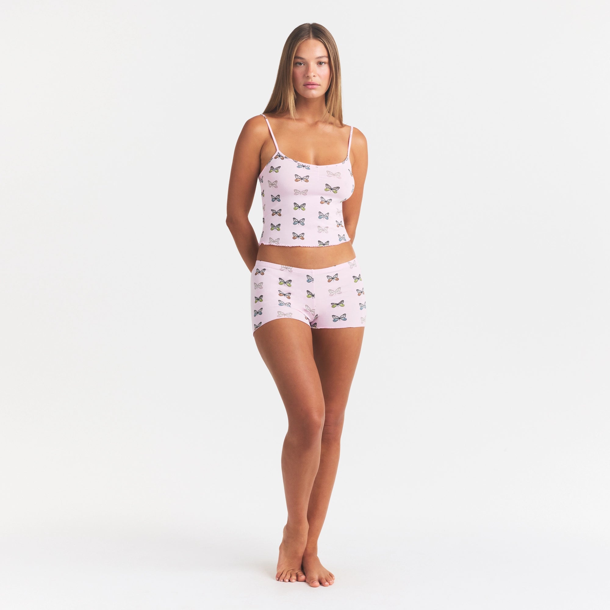 SKIMS SLEEP CAMI SET | PEONY BUTTERFLY PRINT ON A MODEL FRONT VIEW @ | FOCUS: 0.0, 1.0, 0.9