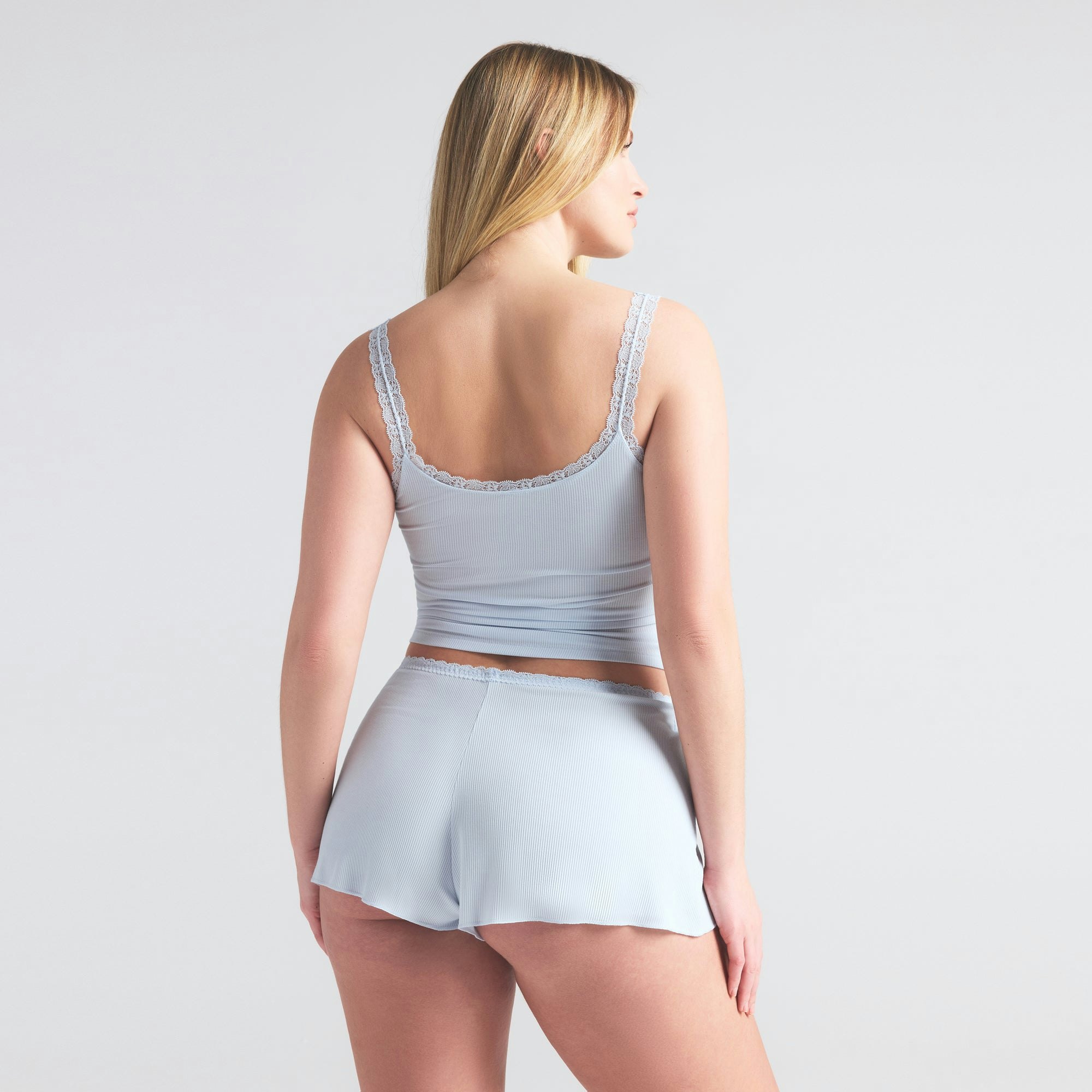 SOFT LOUNGE LACE CAMI AND SHORT SET | BLUE QUARTZ ON A MODEL SIDE VIEW