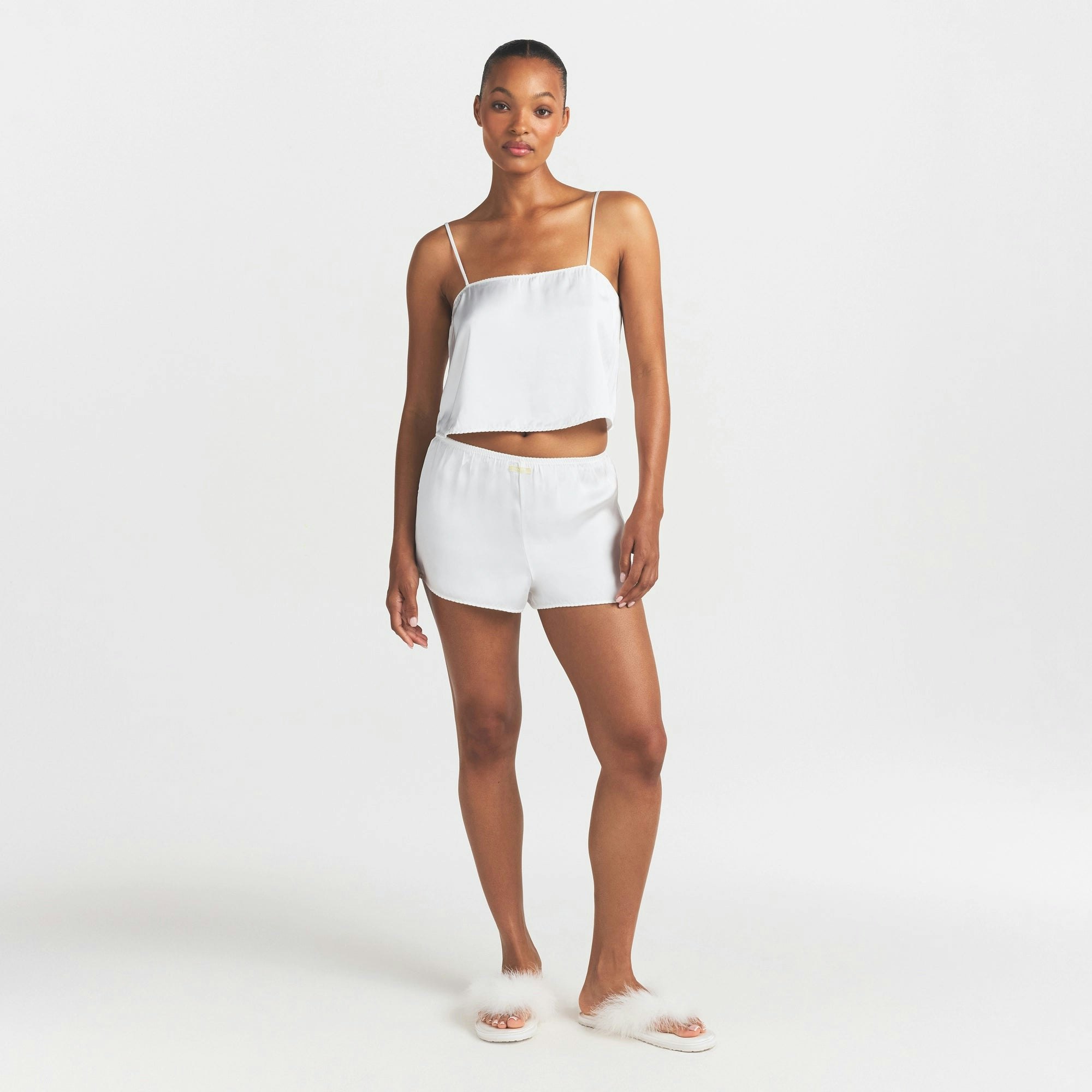 WOVEN SHINE CAMI AND SHORT SLEEP SET | IVORY ON A MODEL FRONT VIEW @ | FOCUS: 0.0, 1.0, 0.9
