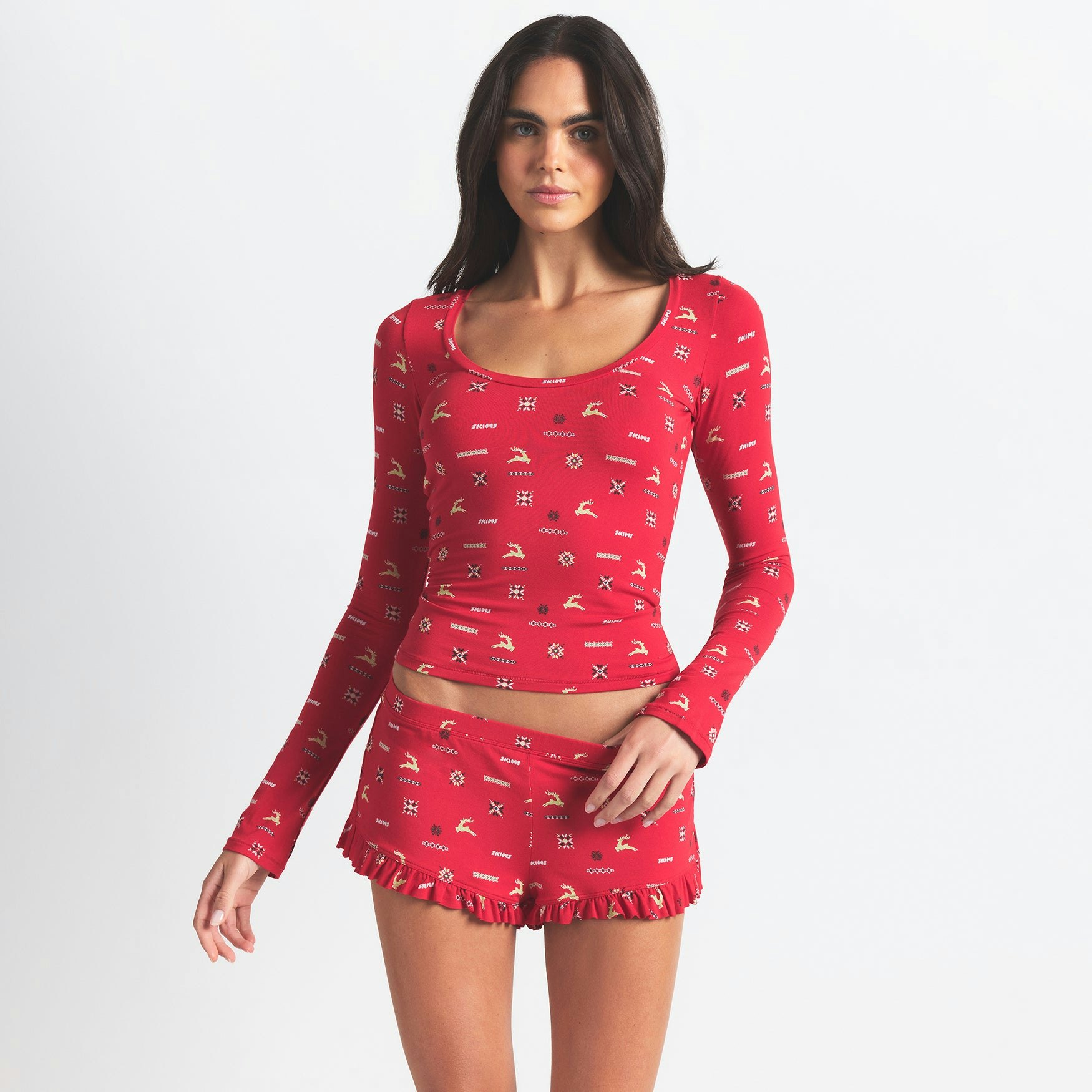 SKIMS SLEEP SCOOP NECK SLEEP SET | CRANBERRY VINTAGE DEER PRINT ON A MODEL FRONT VIEW @ | FOCUS: 0.0, 1.0, 0.9