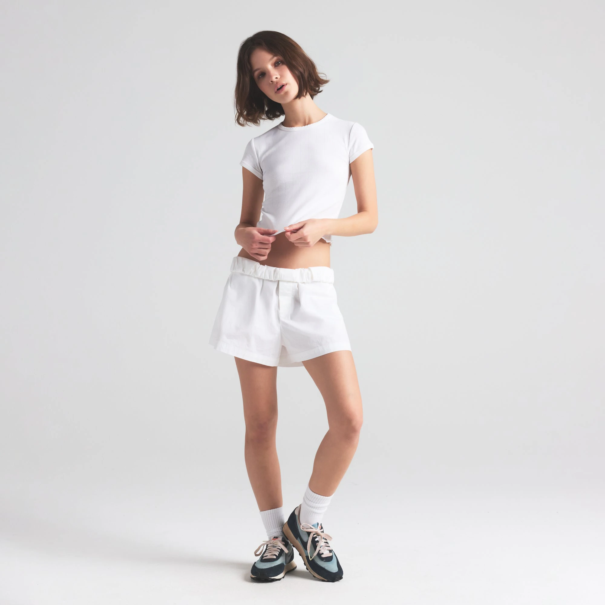 DROP NEEDLE POINTELLE BABY TEE | SNOW ON A MODEL FRONT VIEW | FOCUS: 0.0, 1.0, 0.9