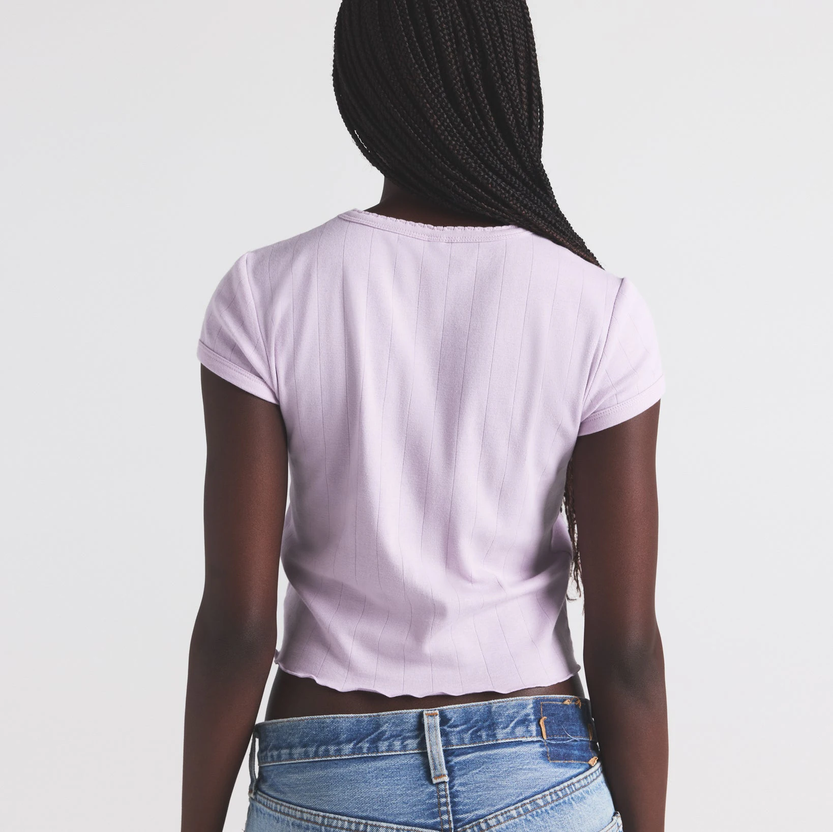 DROP NEEDLE POINTELLE BABY TEE | WISTERIA ON A MODEL SIDE VIEW | FOCUS: 0.0, 1.0, 0.9