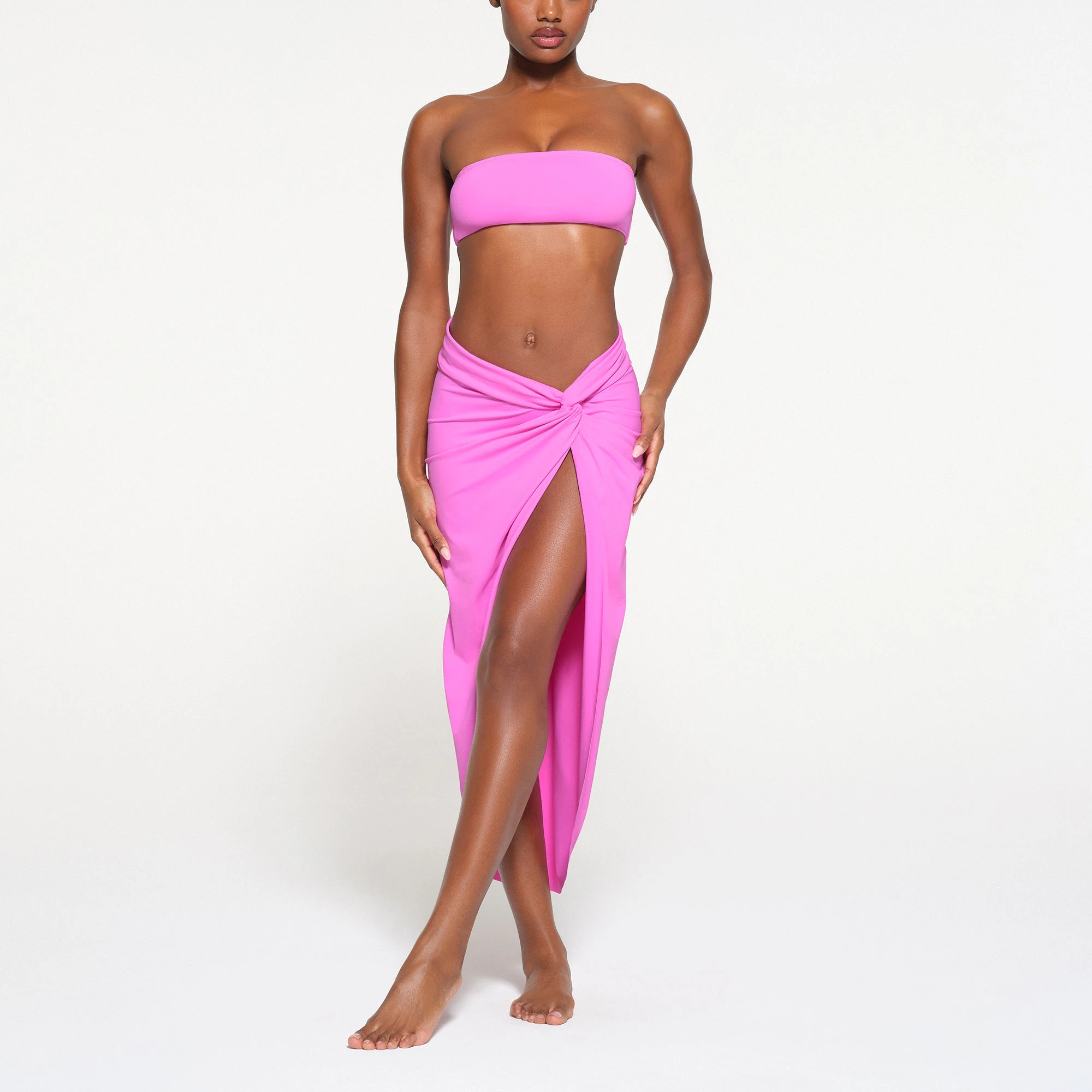 SIGNATURE SWIM BANDEAU BIKINI TOP | NEON ORCHID ON A MODEL FRONT VIEW