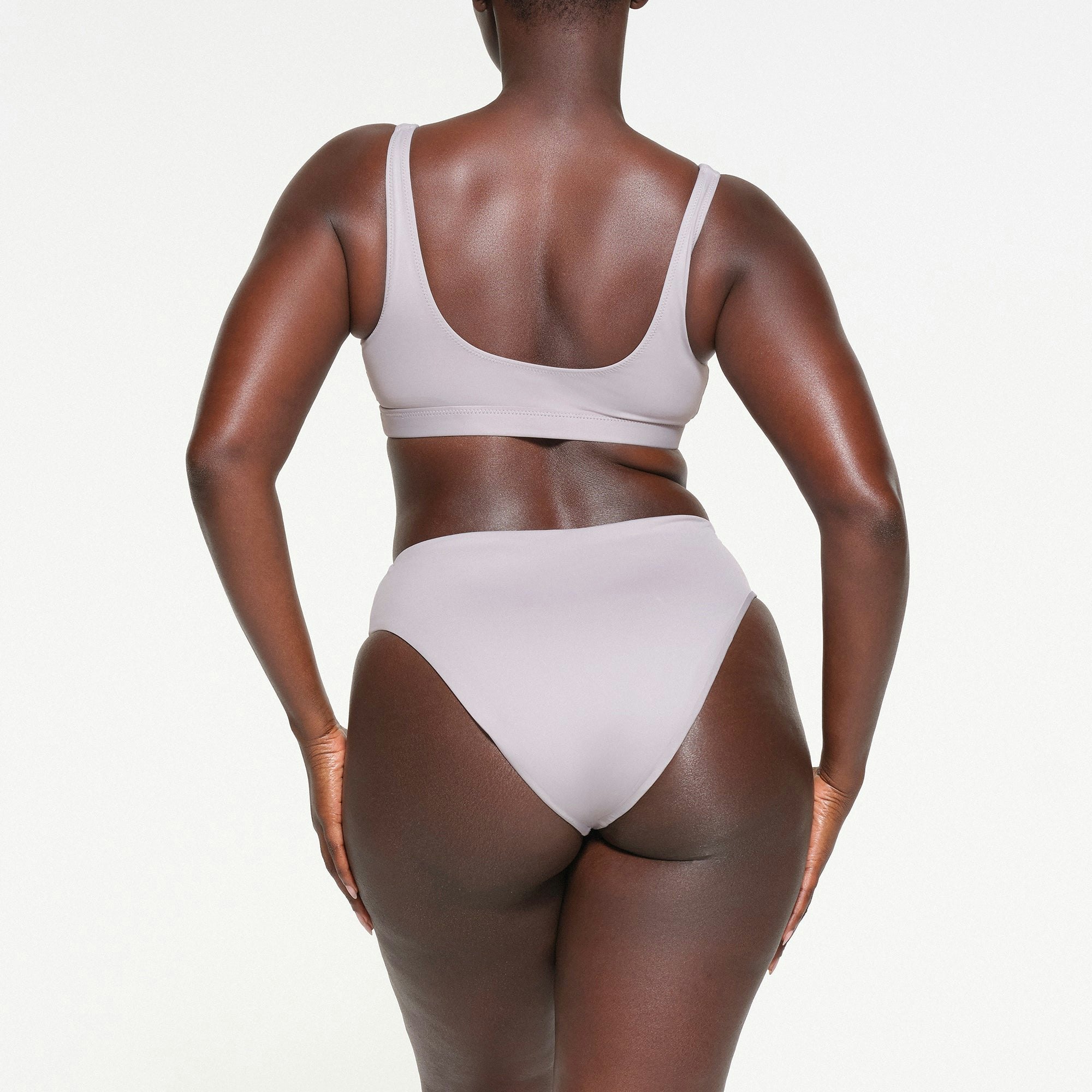 SIGNATURE SWIM MID WAIST BOTTOMS | CHROME ON A MODEL BACK VIEW