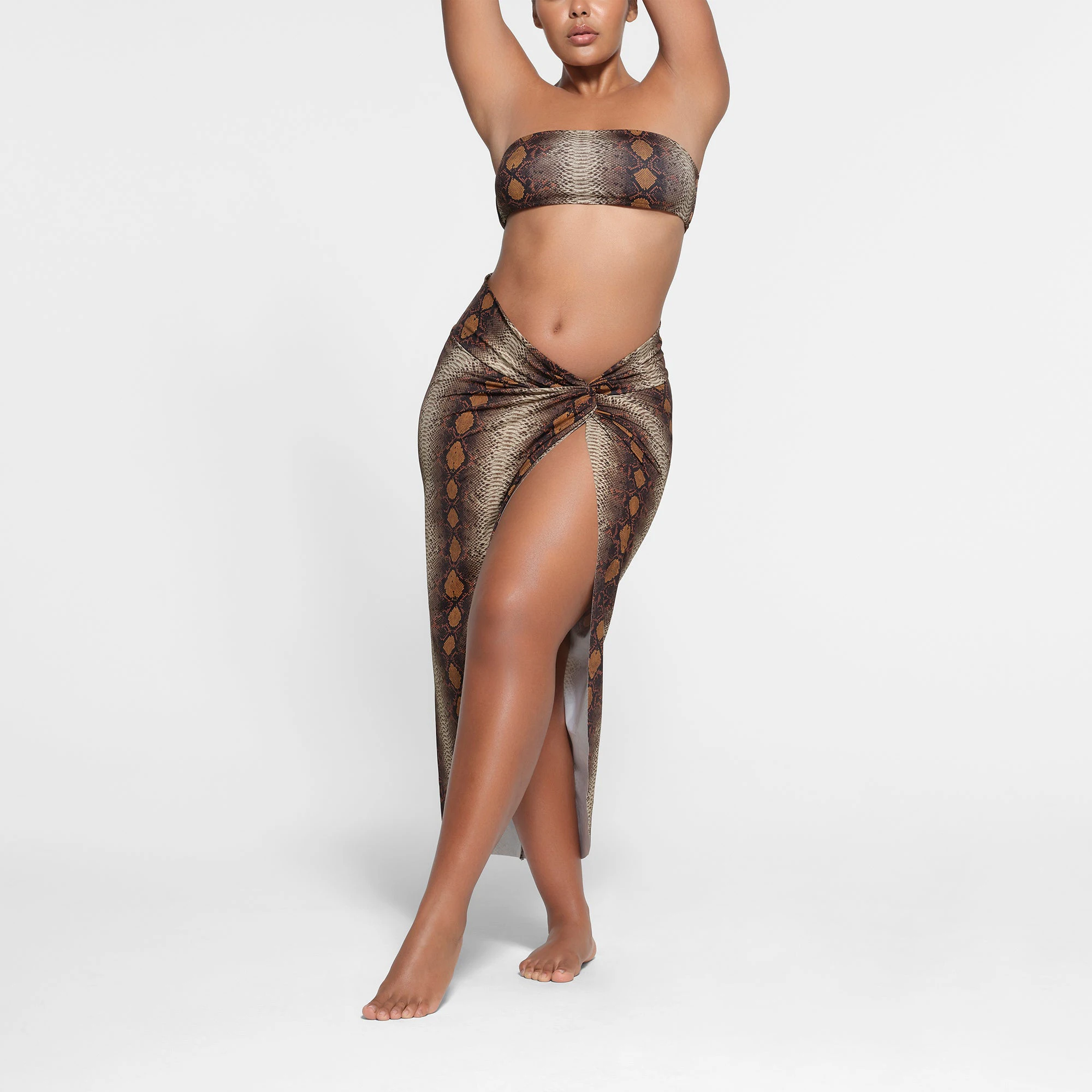 SIGNATURE SWIM SARONG SKIRT | DESERT SNAKE PRINT ON A MODEL FRONT VIEW
