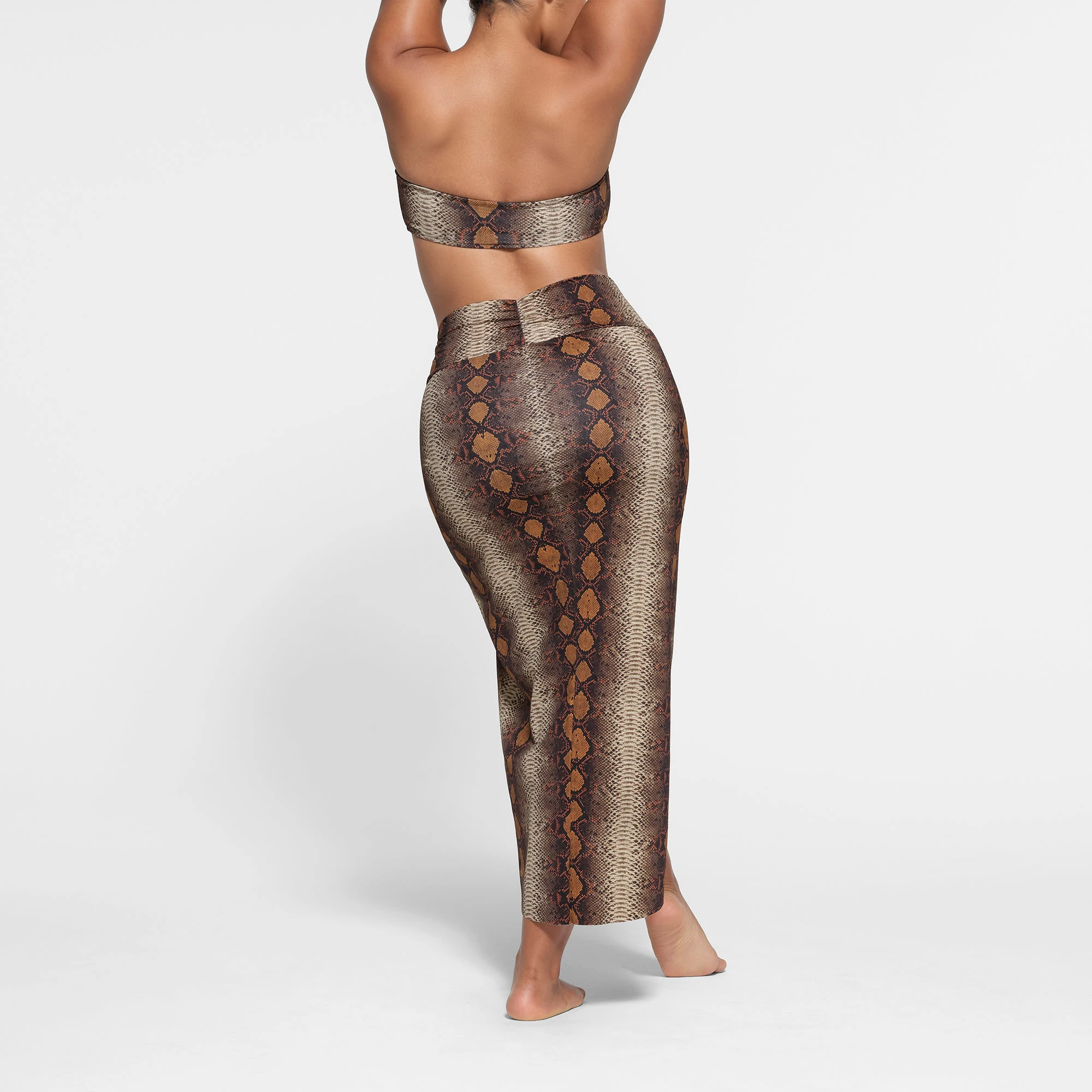 SIGNATURE SWIM SARONG SKIRT | DESERT SNAKE PRINT ON A MODEL BACK VIEW
