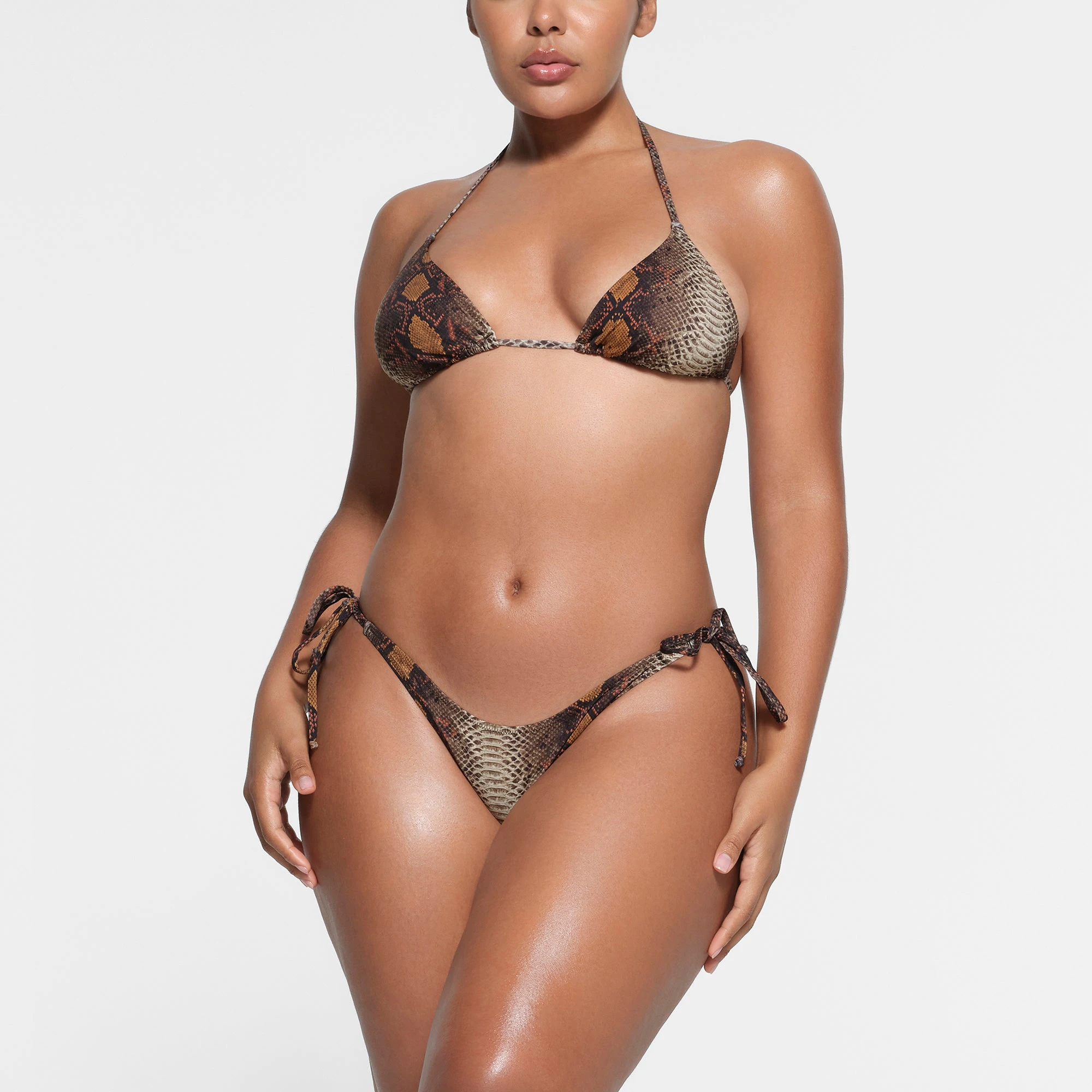 SIGNATURE SWIM TRIANGLE TOP | DESERT SNAKE PRINT ON A MODEL FRONT VIEW