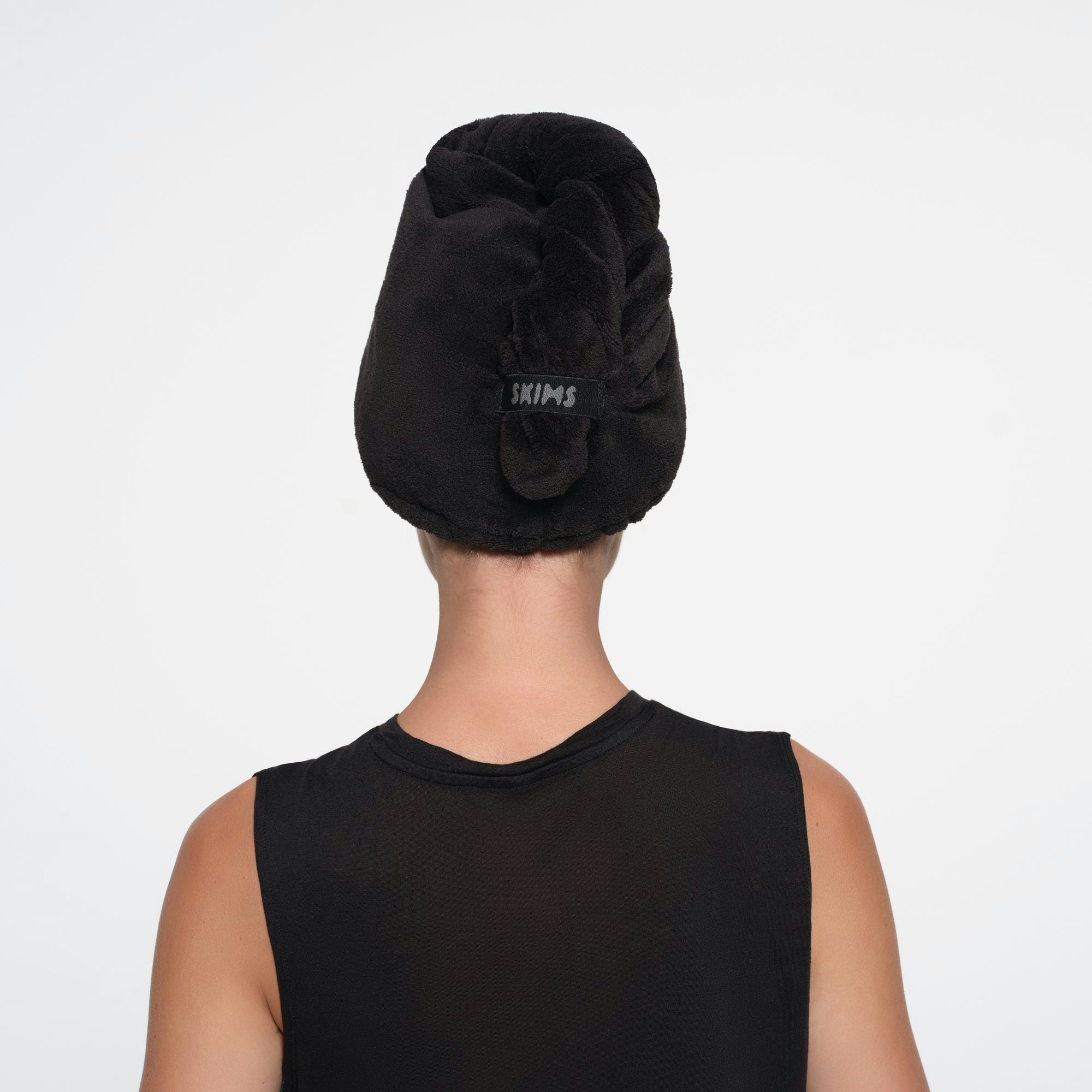 MICRO FIBER HEAD WRAP | ONYX ON A MODEL BACK VIEW