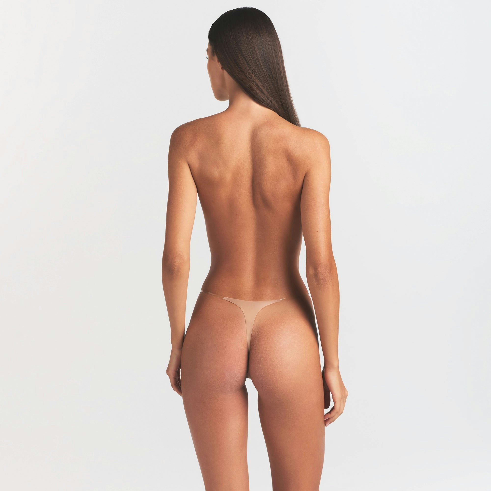 INVISIBLE CLEAR STRAP STRING THONG | CLAY ON A MODEL SIDE VIEW @ | FOCUS: 0.0, 1.0, 0.9
