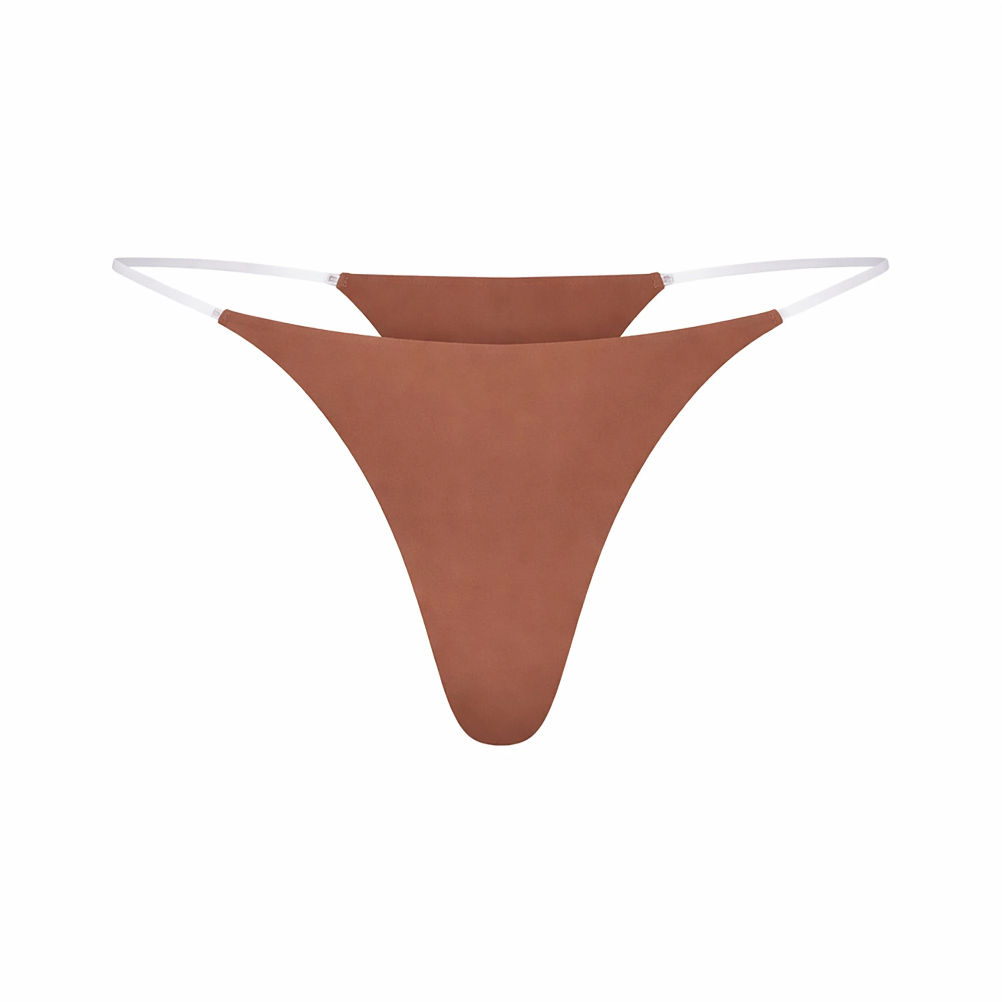INVISIBLE CLEAR STRAP STRING THONG | SIENNA LAYS FLAT ON A WHITE BACKGROUND | FLT