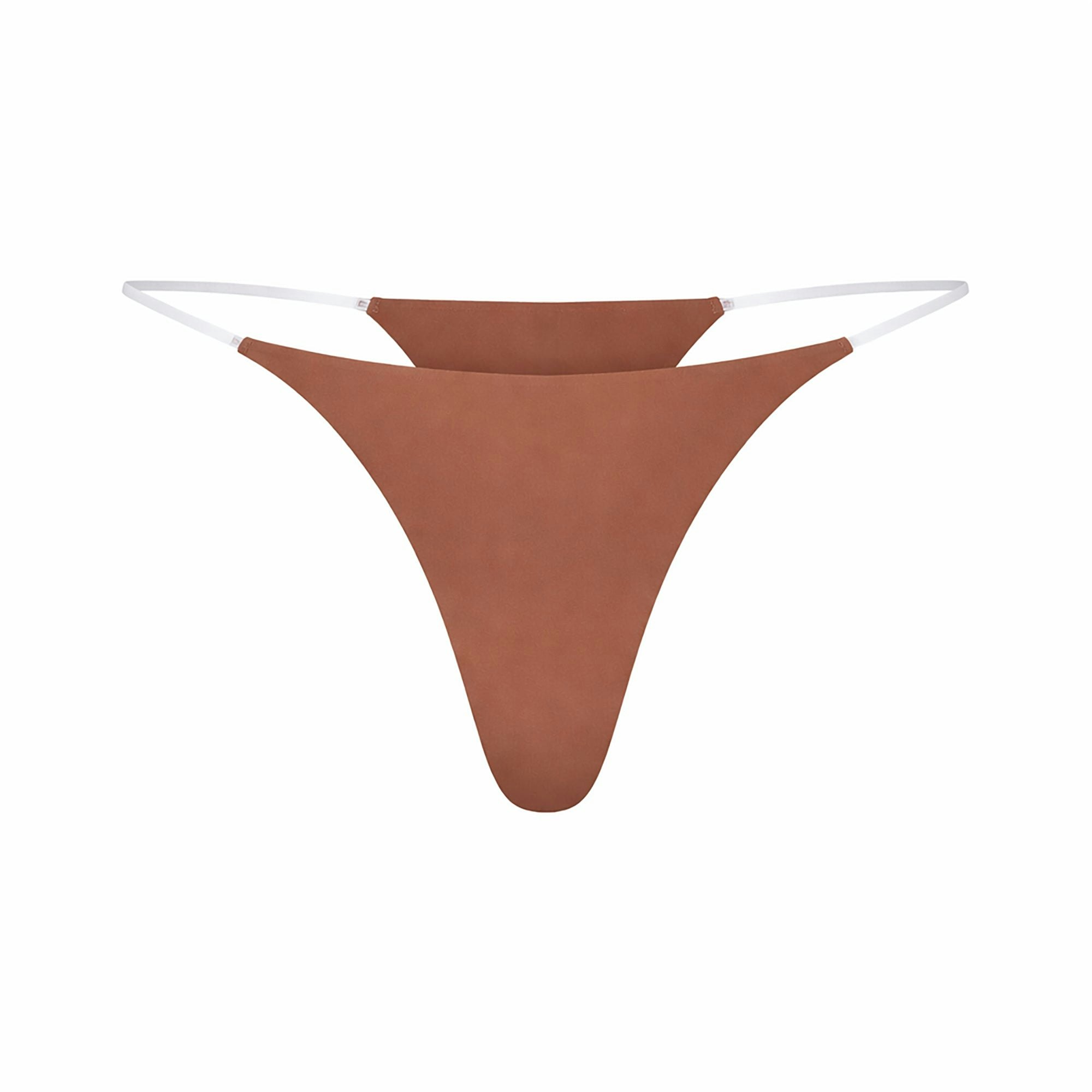 INVISIBLE CLEAR STRAP STRING THONG | SIENNA LAYS FLAT ON A WHITE BACKGROUND | FLT