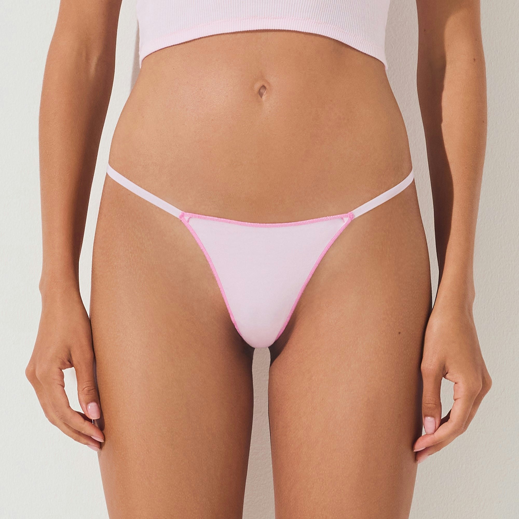 LIGHTWEIGHT COTTON STRING THONG 7-PACK | SNOW MINERAL MULTI ON A MODEL SIDE VIEW @ | FOCUS: 0.0, 1.0, 0.9