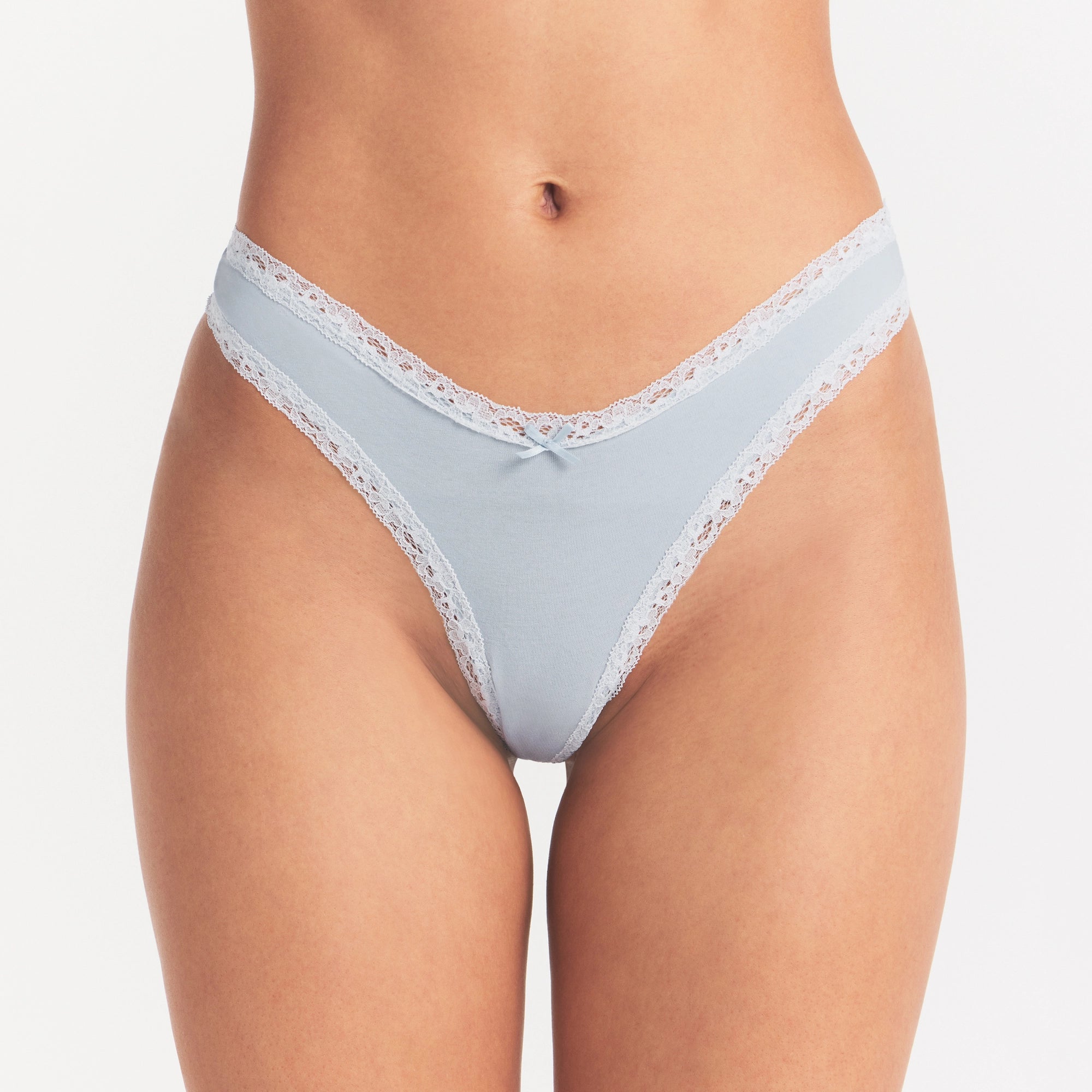 LIGHTWEIGHT COTTON LACE THONG | AIRSPACE ON A MODEL SIDE VIEW @ | FOCUS: 0.0, 1.0, 0.9