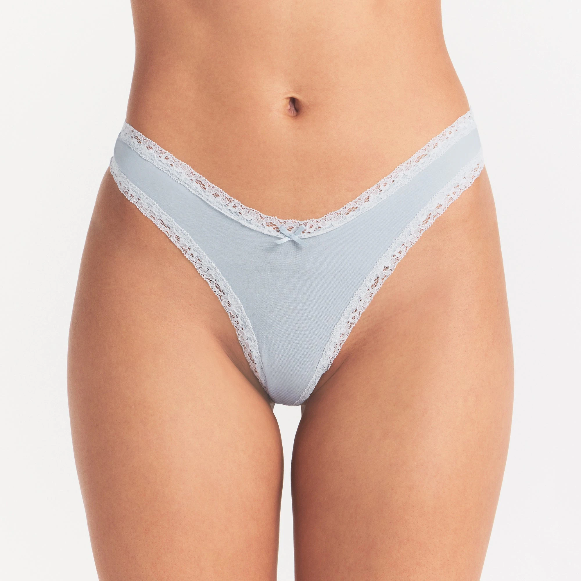 LIGHTWEIGHT COTTON LACE THONG | AIRSPACE ON A MODEL SIDE VIEW @ | FOCUS: 0.0, 1.0, 0.9