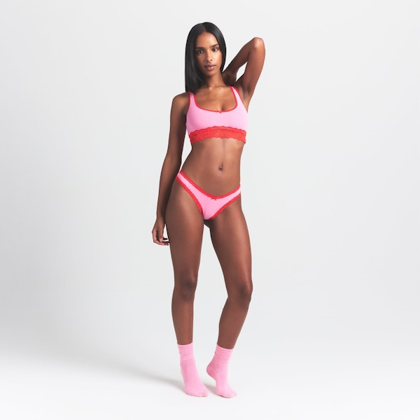 LIGHTWEIGHT COTTON LACE THONG | CARNATION CONTRAST ON A MODEL FRONT VIEW @ | FOCUS: 0.0, 1.0, 0.9