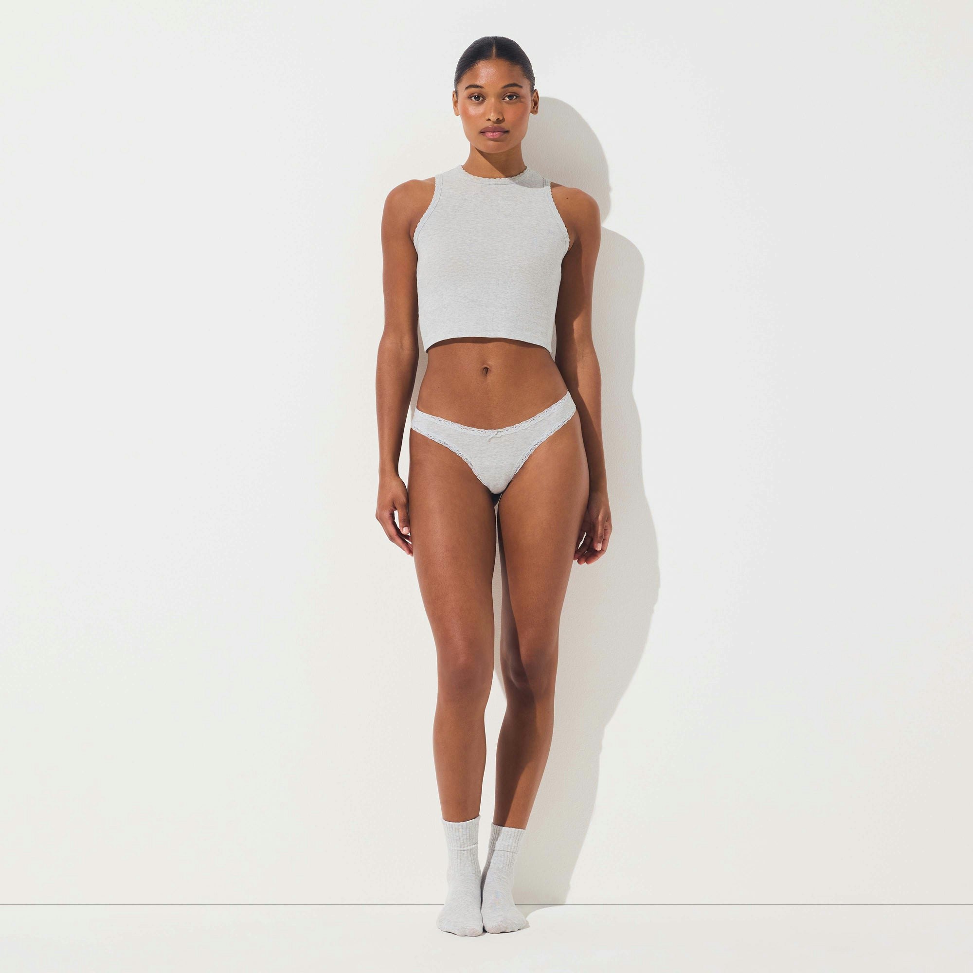 LIGHTWEIGHT COTTON LACE THONG | LIGHT HEATHER GREY ON A MODEL FRONT VIEW @ | FOCUS: 0.0, 1.0, 0.9