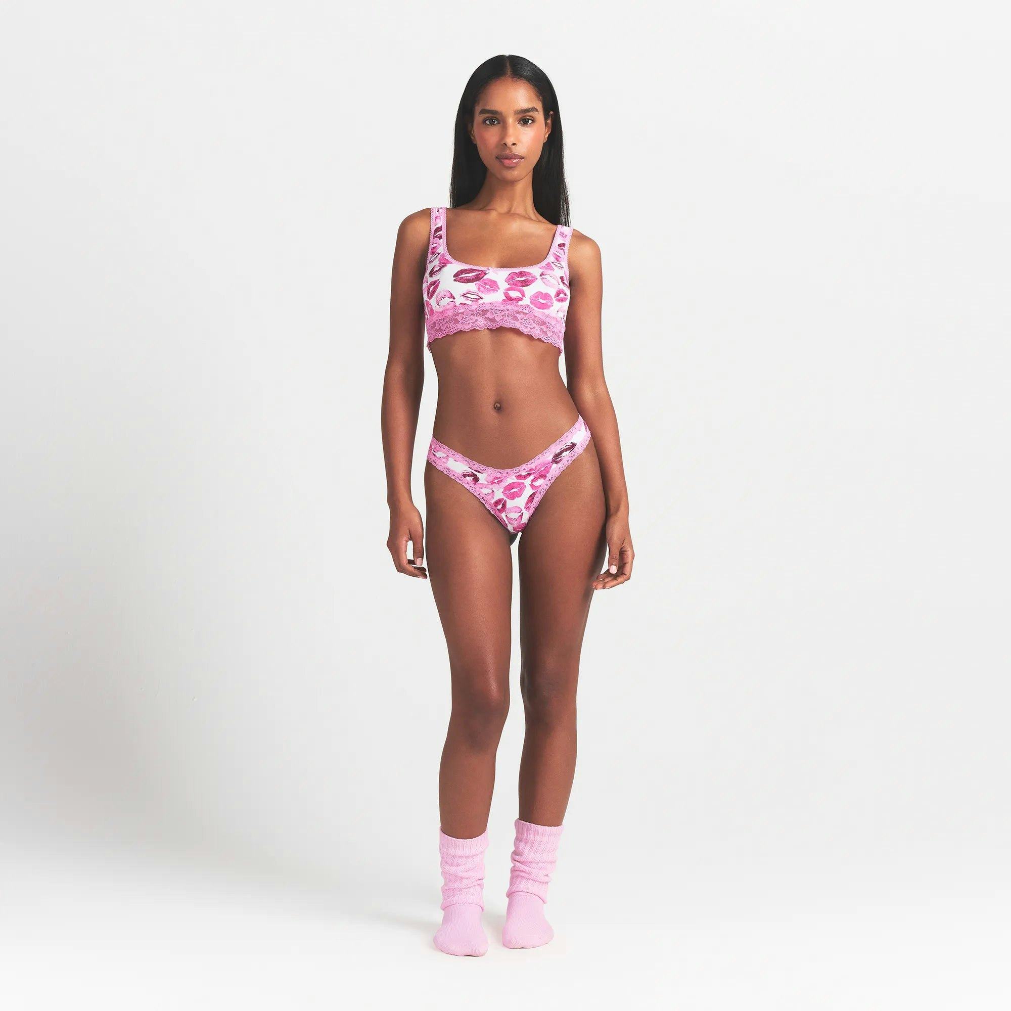 LIGHTWEIGHT COTTON LACE THONG | PINK ALLOVER LIPSTICK ON A MODEL FRONT VIEW @ | FOCUS: 0.0, 1.0, 0.9