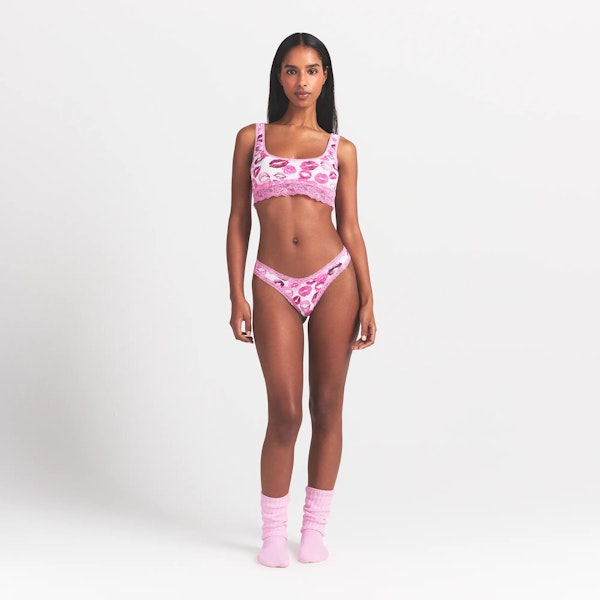 LIGHTWEIGHT COTTON LACE THONG | PINK ALLOVER LIPSTICK ON A MODEL FRONT VIEW @ | FOCUS: 0.0, 1.0, 0.9