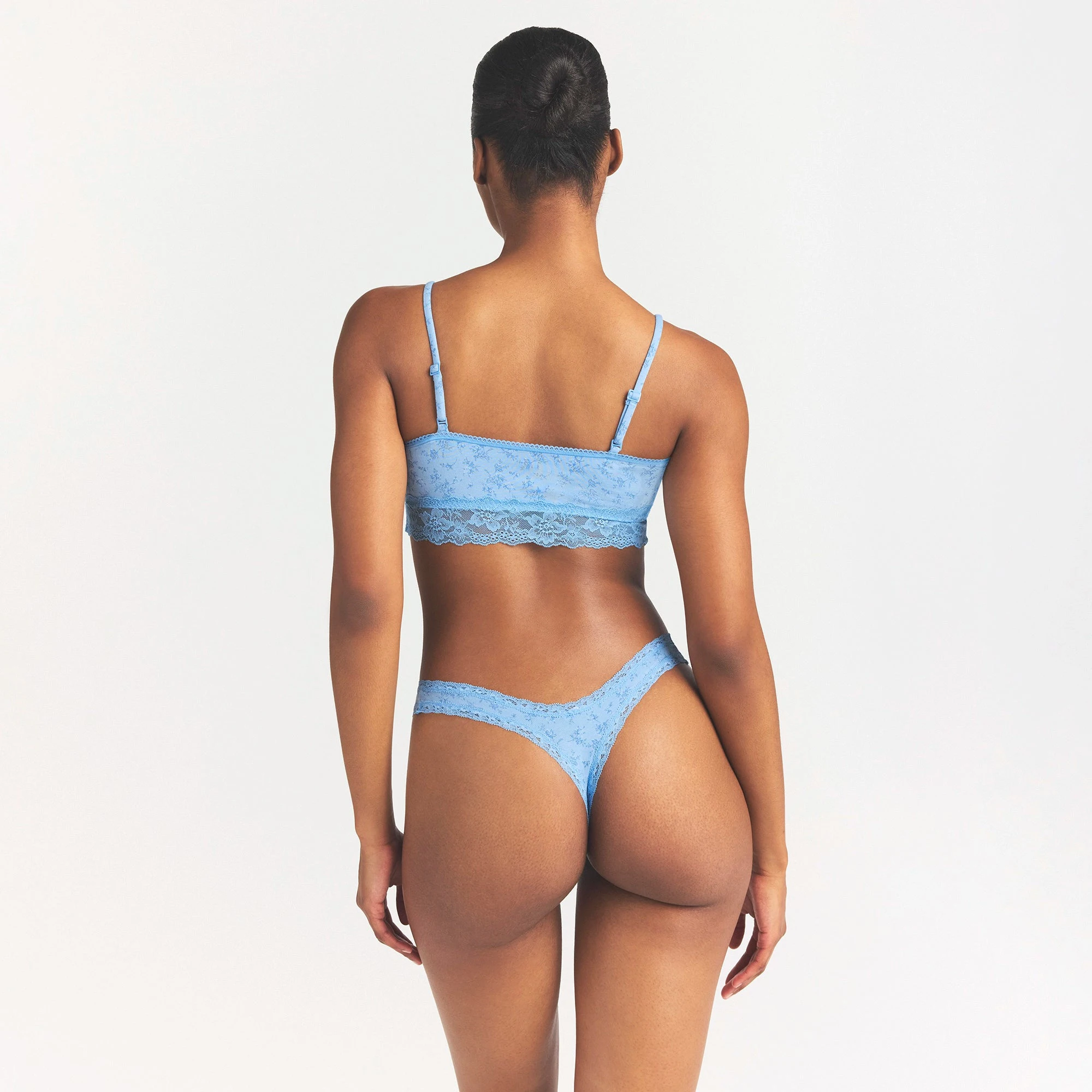 LIGHTWEIGHT COTTON LACE THONG | SURF DAINTY FLORAL PRINT ON A MODEL SIDE VIEW @ | FOCUS: 0.0, 1.0, 0.9
