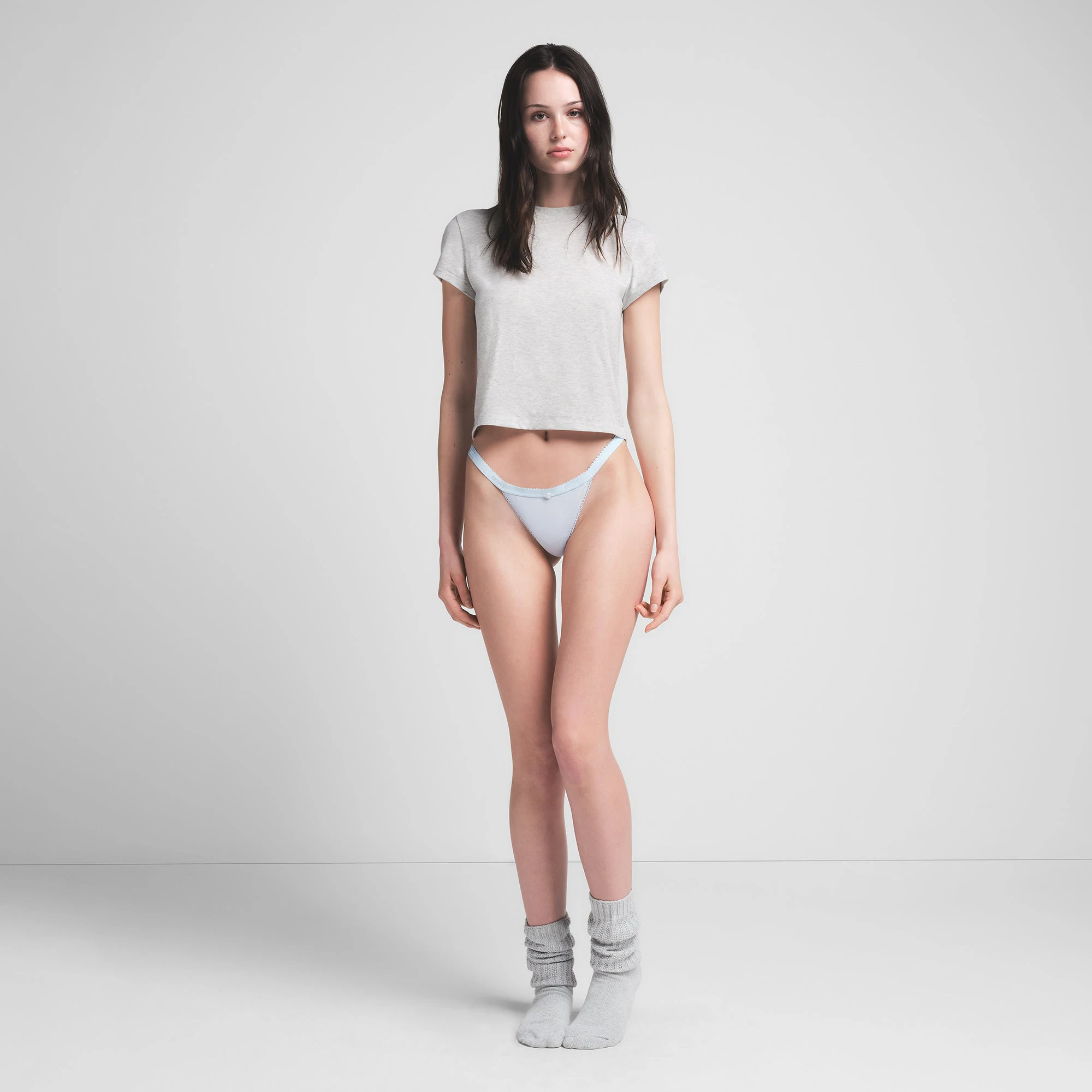 LIGHTWEIGHT COTTON PICOT LOGO THONG | ZEN BLUE ON A MODEL FRONT VIEW | FOCUS: 0.0, 1.0, 0.9