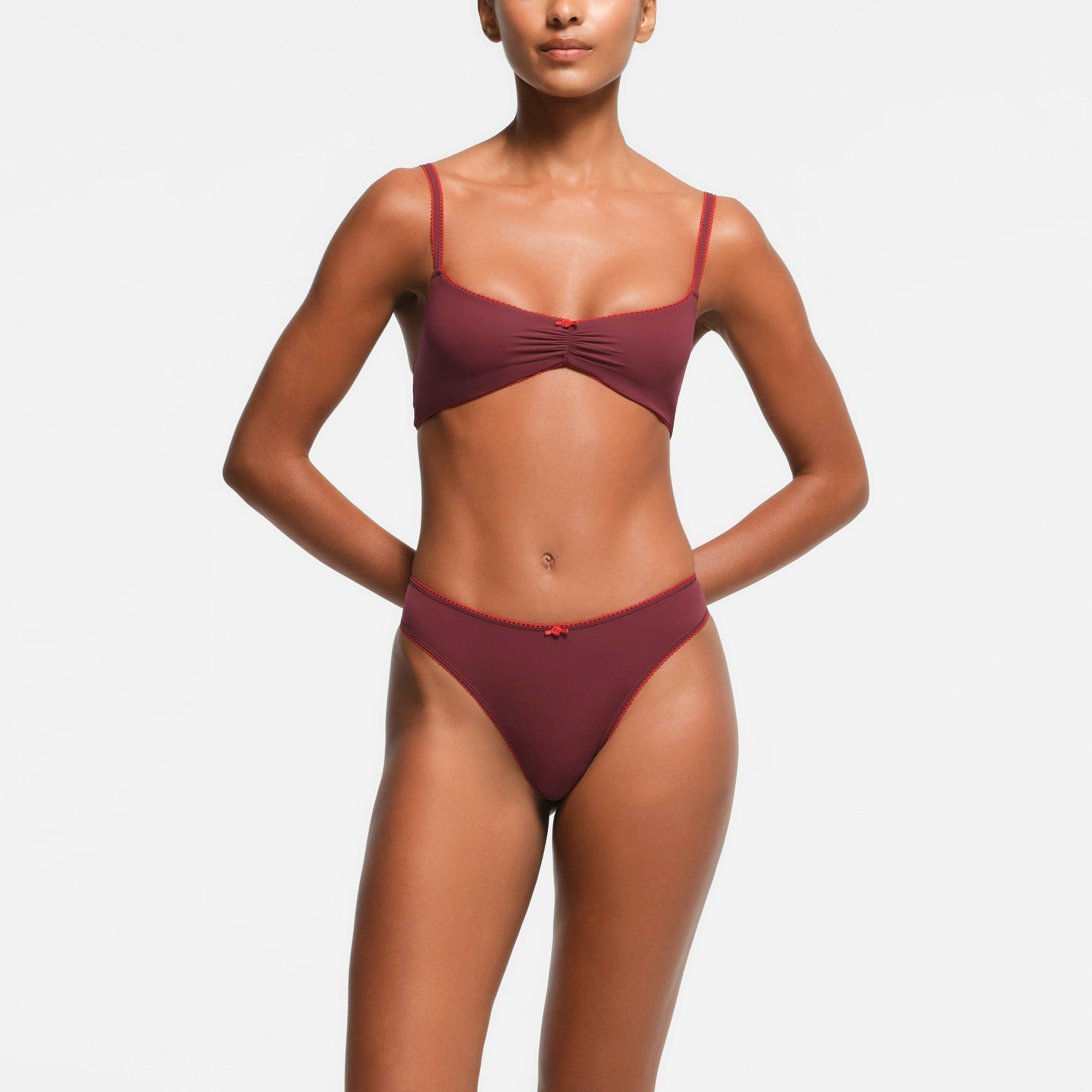 FITS EVERYBODY PICOT TRIM THONG | WINE CONTRAST ON A MODEL FRONT VIEW