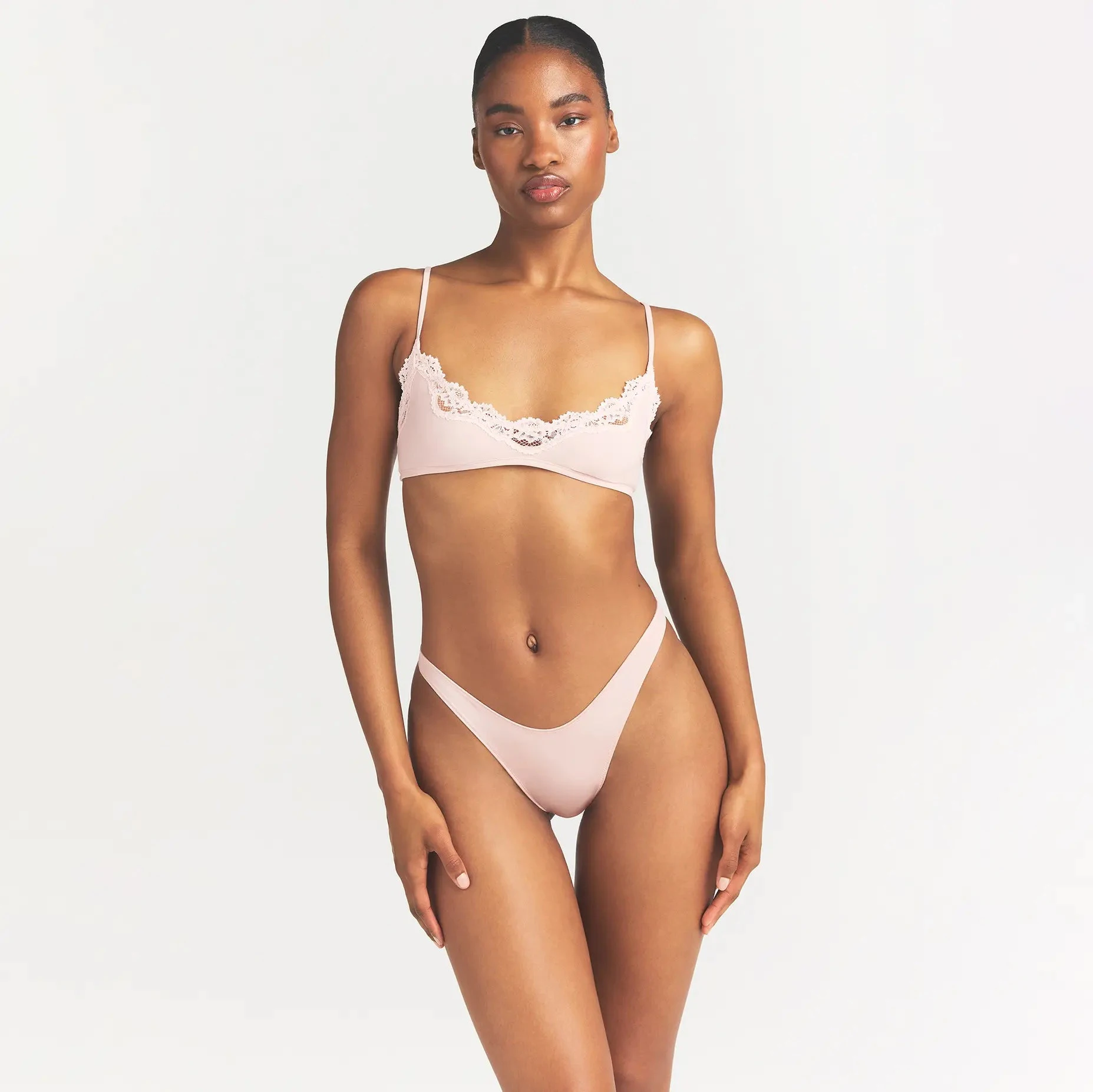 SHINE FOUNDATIONS DIPPED THONG | DUSTY PINK ON A MODEL FRONT VIEW @ | FOCUS: 0.0, 1.0, 0.9