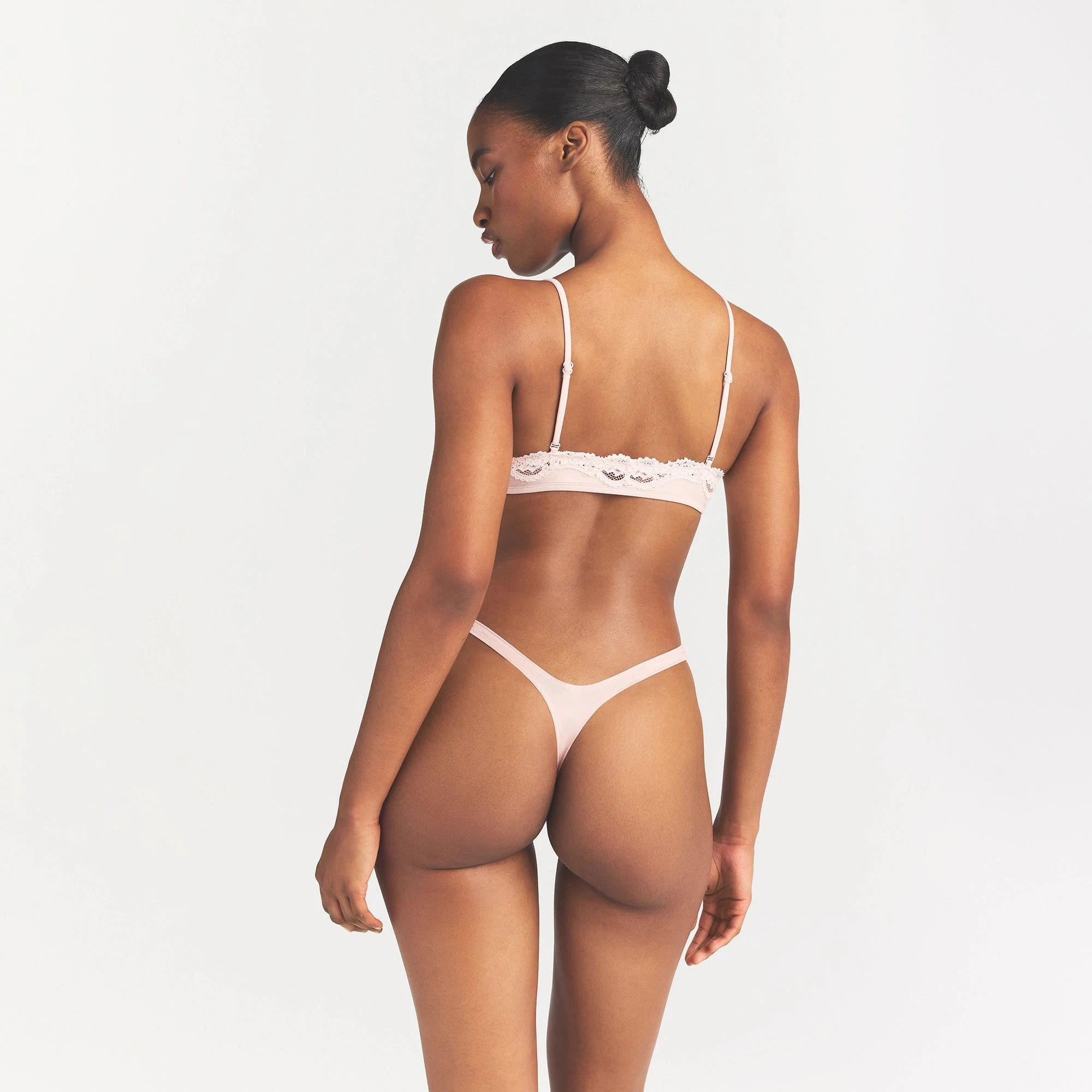 SHINE FOUNDATIONS DIPPED THONG | DUSTY PINK ON A MODEL BACK VIEW @ | FOCUS: 0.0, 1.0, 0.9