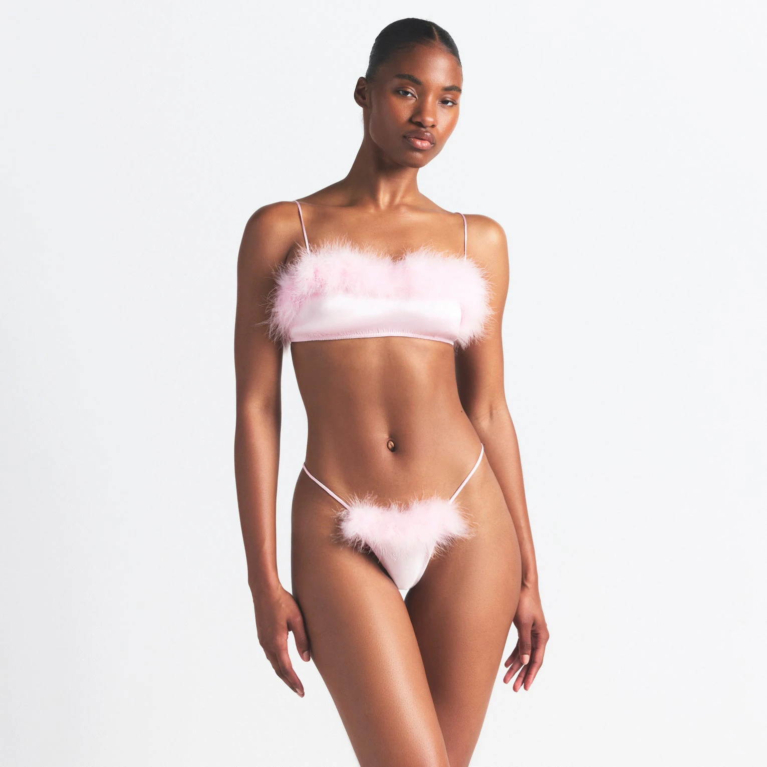 SILK FEATHER TRIM BUTTERFLY THONG | CHERRY BLOSSOM ON A MODEL SIDE VIEW @ | FOCUS: 0.0, 1.0, 0.9