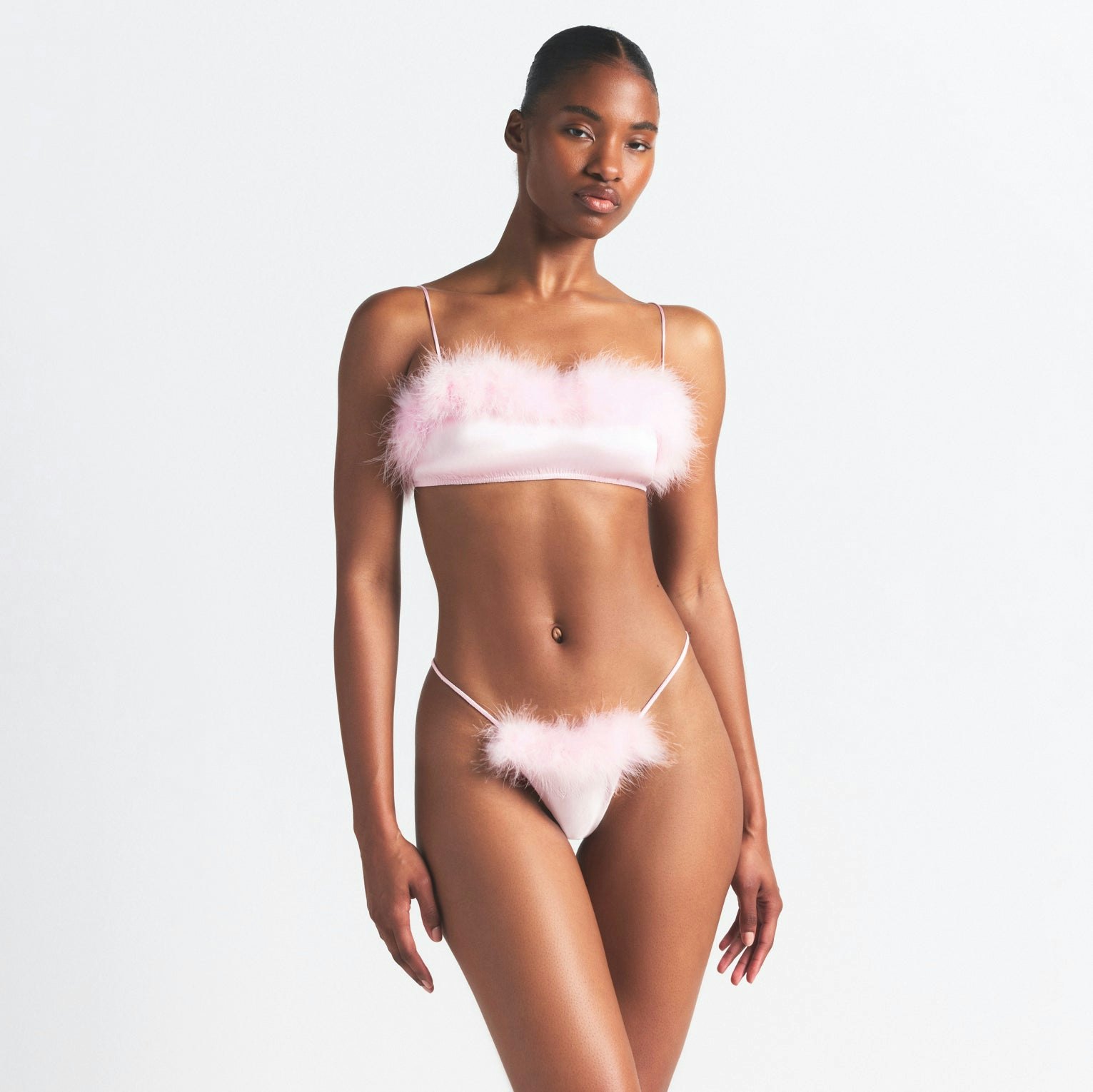 SILK FEATHER TRIM BUTTERFLY THONG | CHERRY BLOSSOM ON A MODEL SIDE VIEW @ | FOCUS: 0.0, 1.0, 0.9