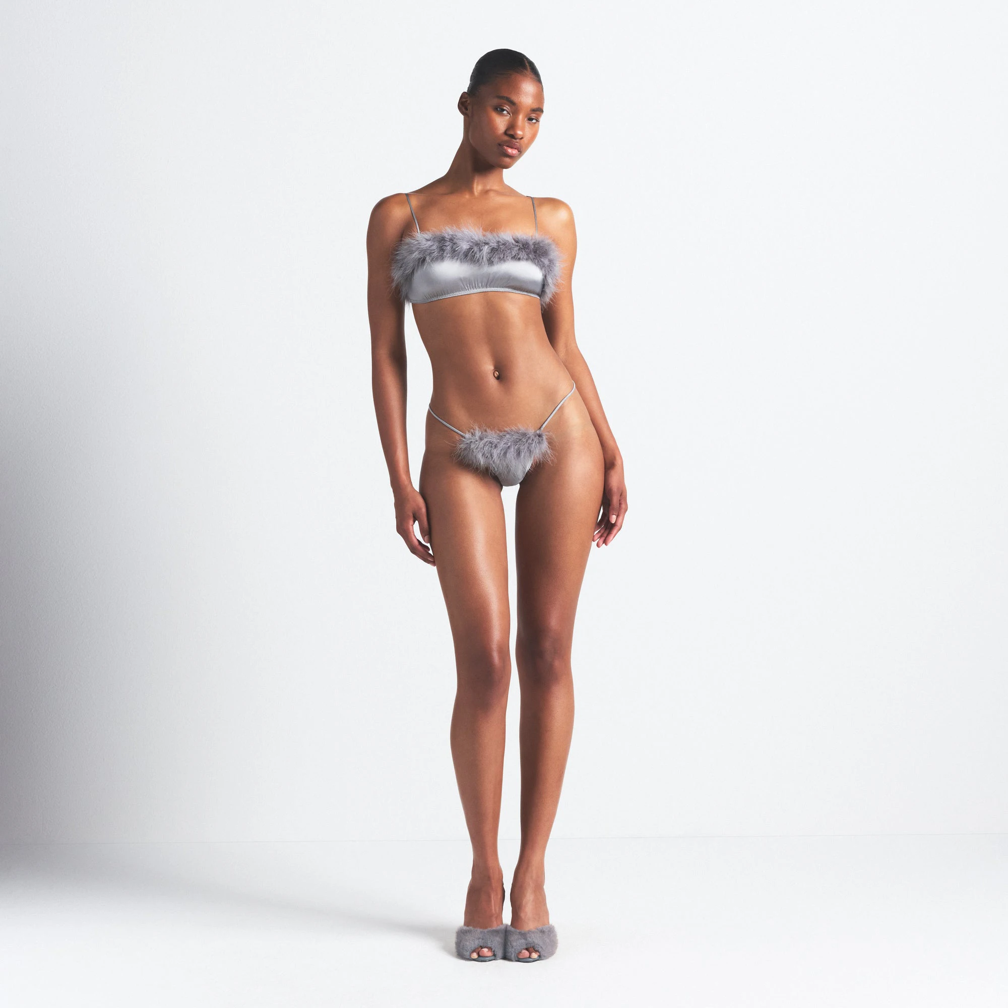 SILK FEATHER TRIM BUTTERFLY THONG | MIRROR ON A MODEL FRONT VIEW @ | FOCUS: 0.0, 1.0, 0.9