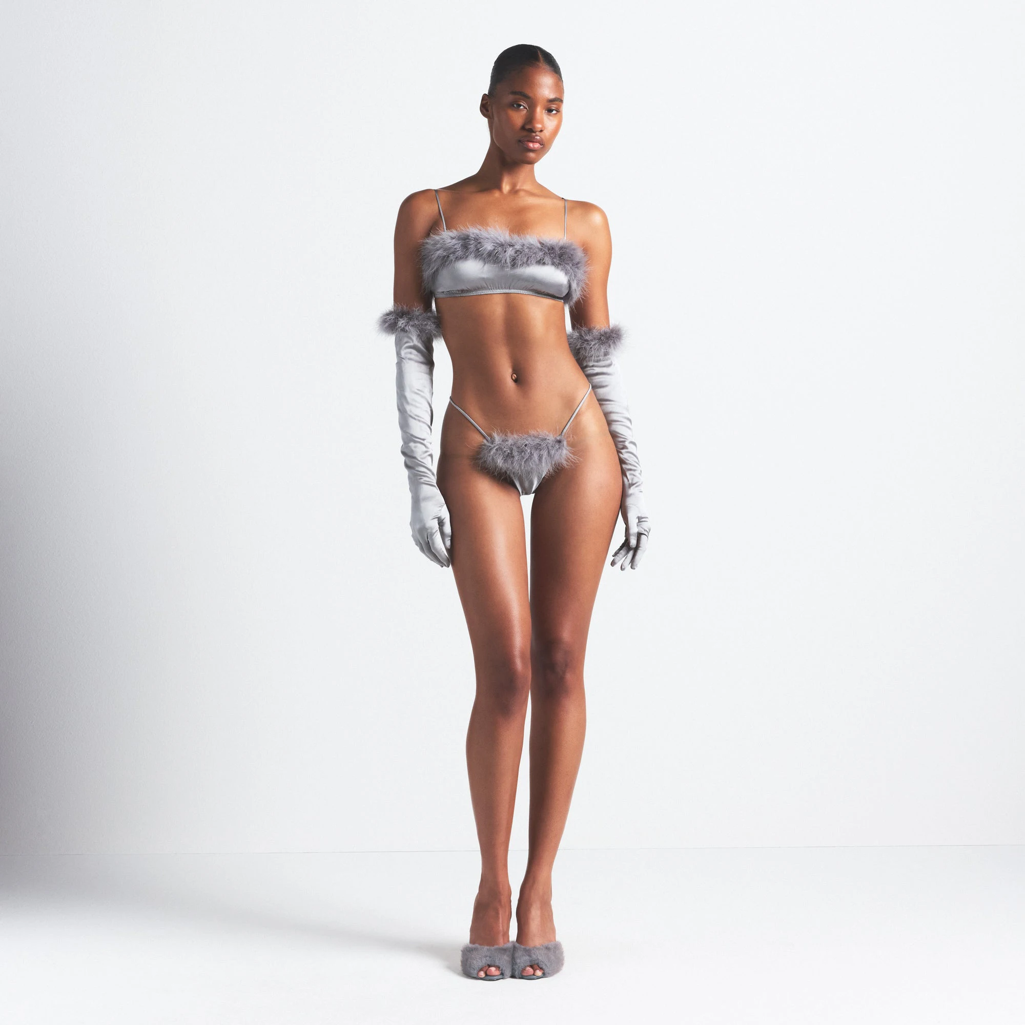 SILK FEATHER TRIM BUTTERFLY THONG | MIRROR ON A MODEL FRONT VIEW @ | FOCUS: 0.0, 1.0, 0.9