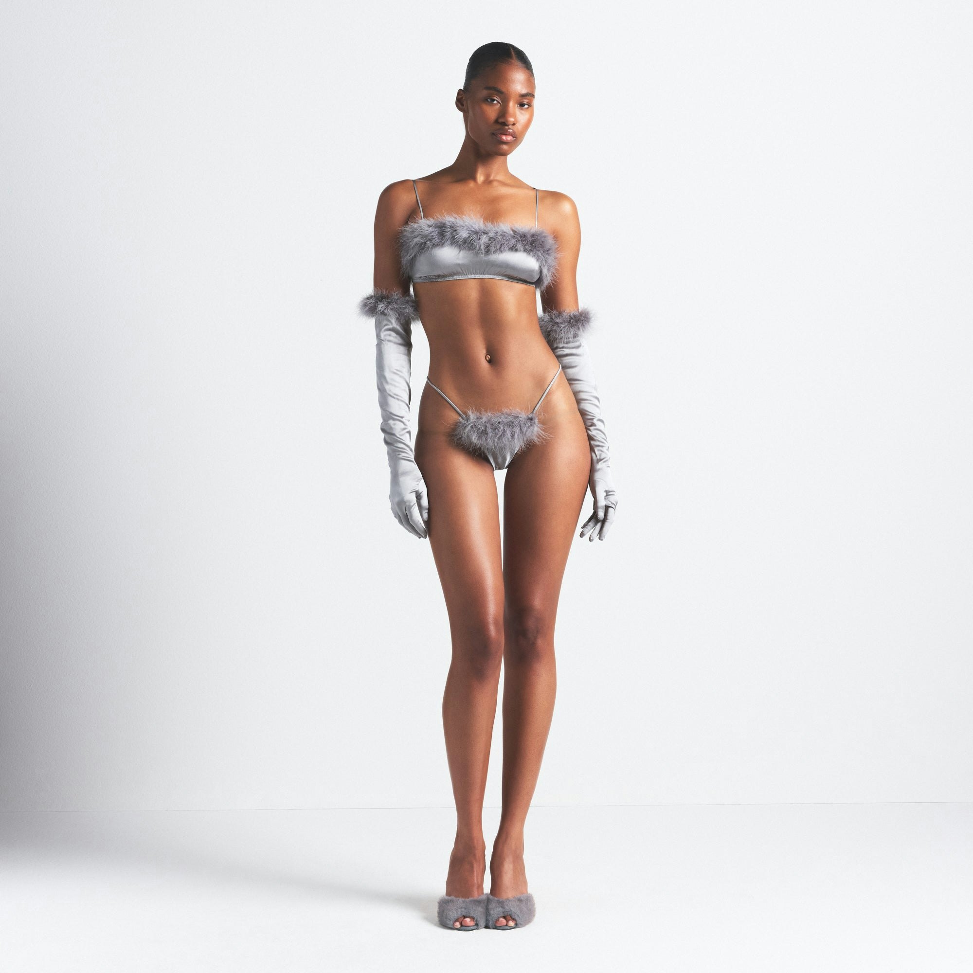 SILK FEATHER TRIM BUTTERFLY THONG | MIRROR ON A MODEL FRONT VIEW @ | FOCUS: 0.0, 1.0, 0.9