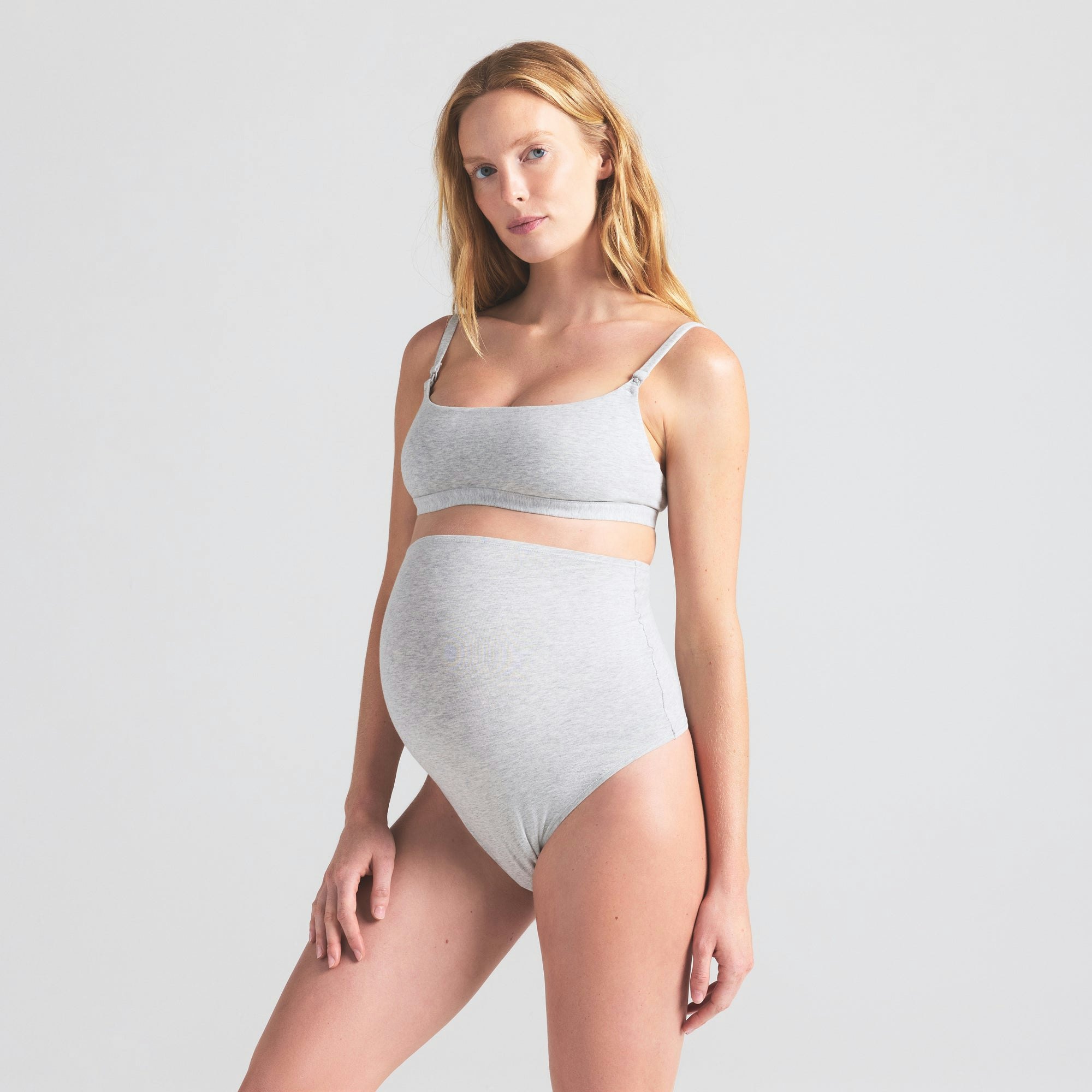 COTTON JERSEY MATERNITY HIGH-WAISTED THONG | LIGHT HEATHER GREY ON A MODEL SIDE VIEW | FOCUS: 0.0, 1.0, 0.9