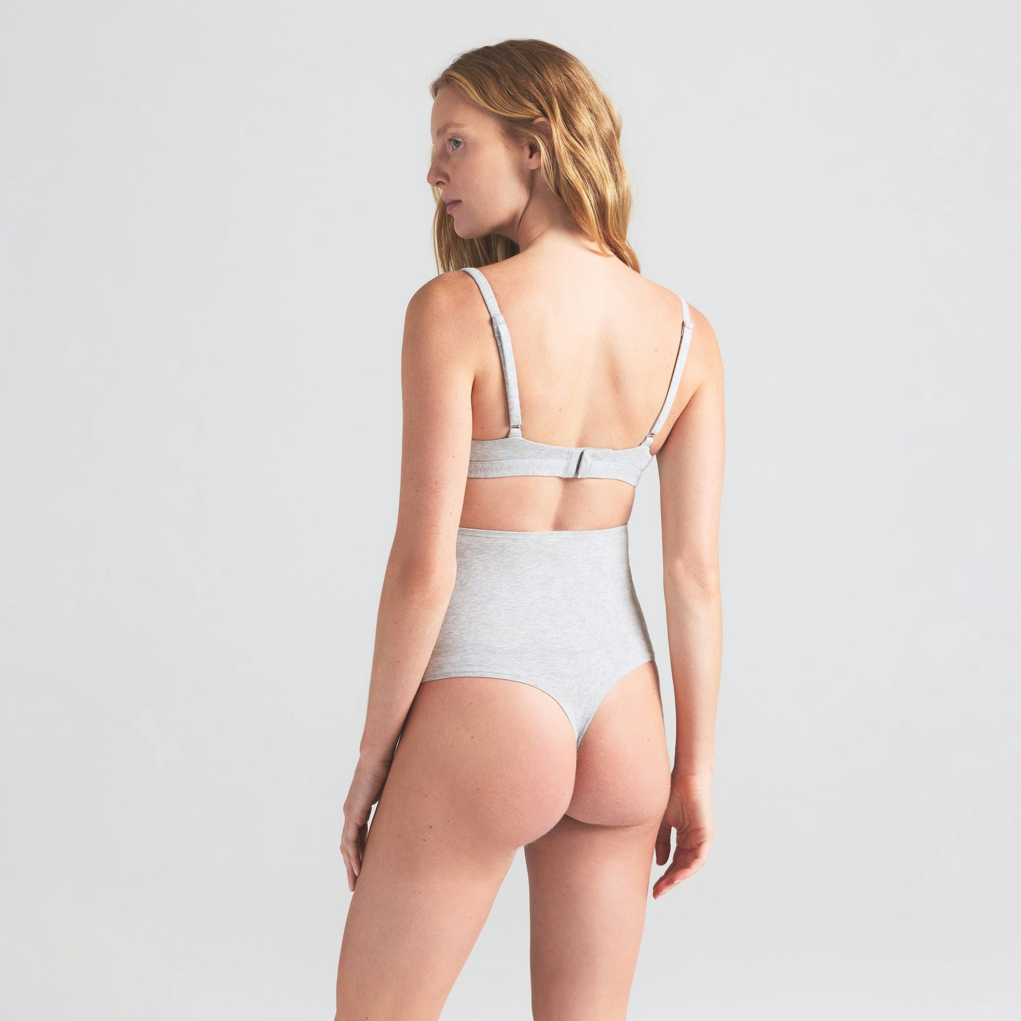 COTTON JERSEY MATERNITY HIGH-WAISTED THONG | LIGHT HEATHER GREY ON A MODEL SIDE VIEW | FOCUS: 0.0, 1.0, 0.9