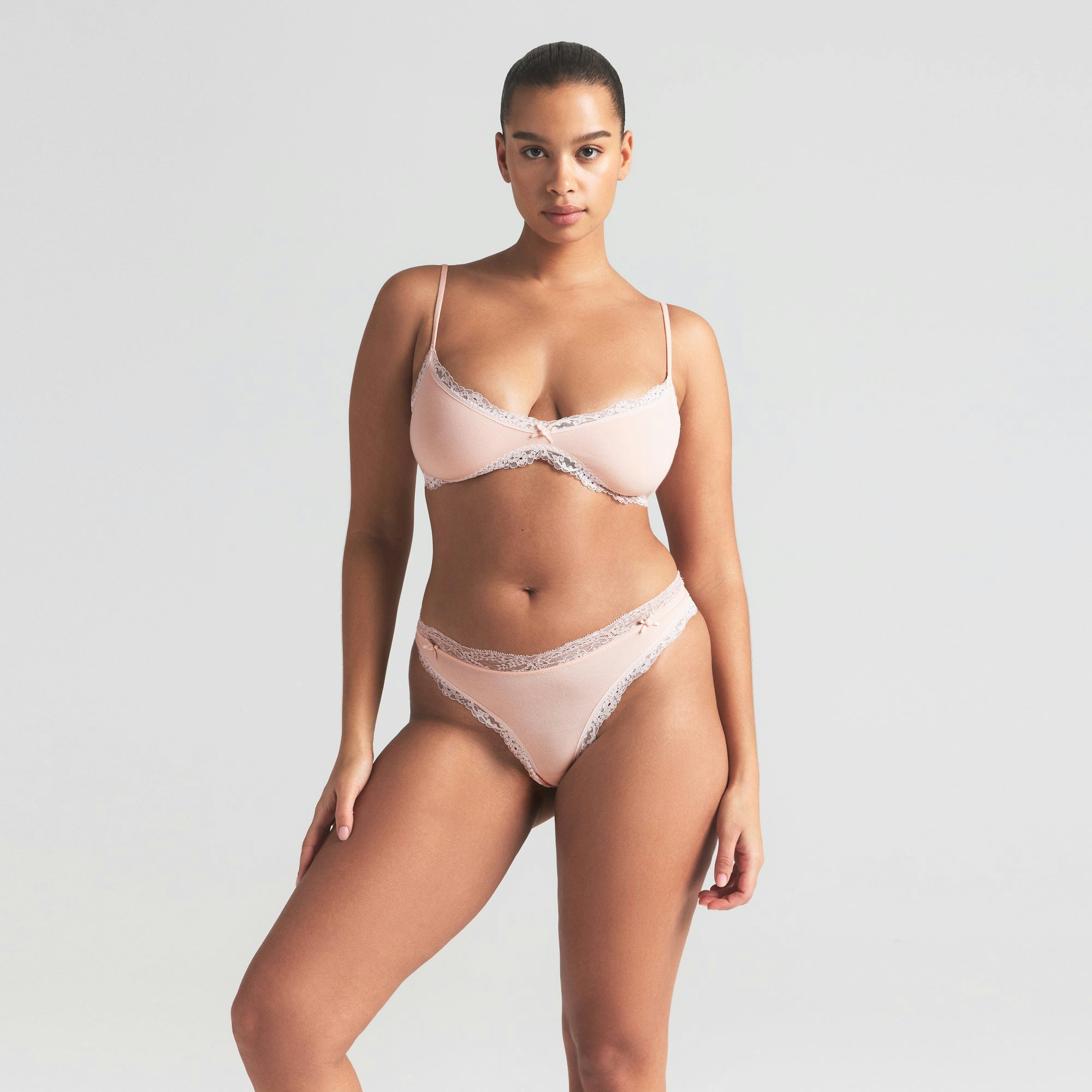 COTTON JERSEY LACE THONG | PRIMROSE ON A MODEL SIDE VIEW | FOCUS: 0.0, 1.0, 0.9