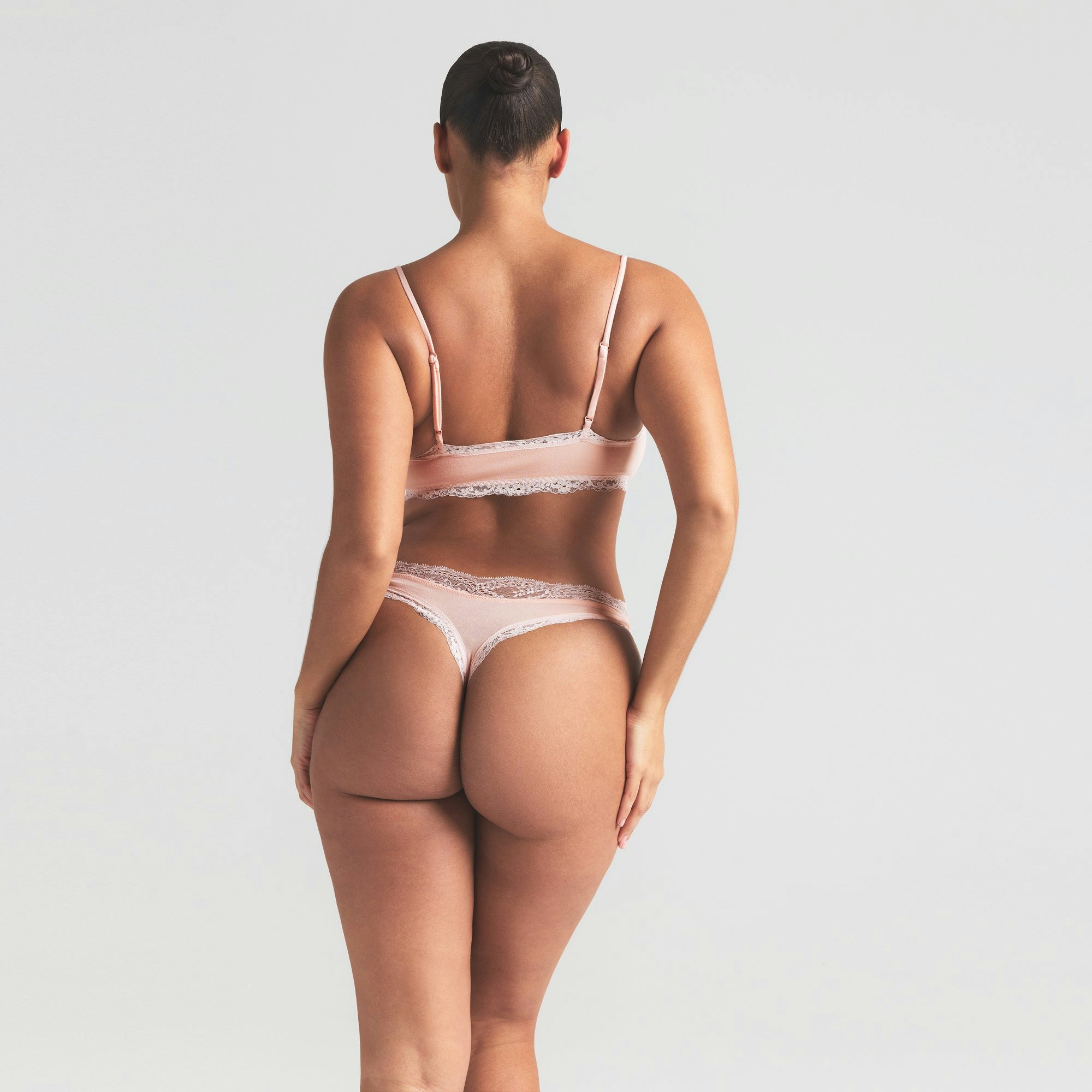 COTTON JERSEY LACE THONG | PRIMROSE ON A MODEL SIDE VIEW | FOCUS: 0.0, 1.0, 0.9